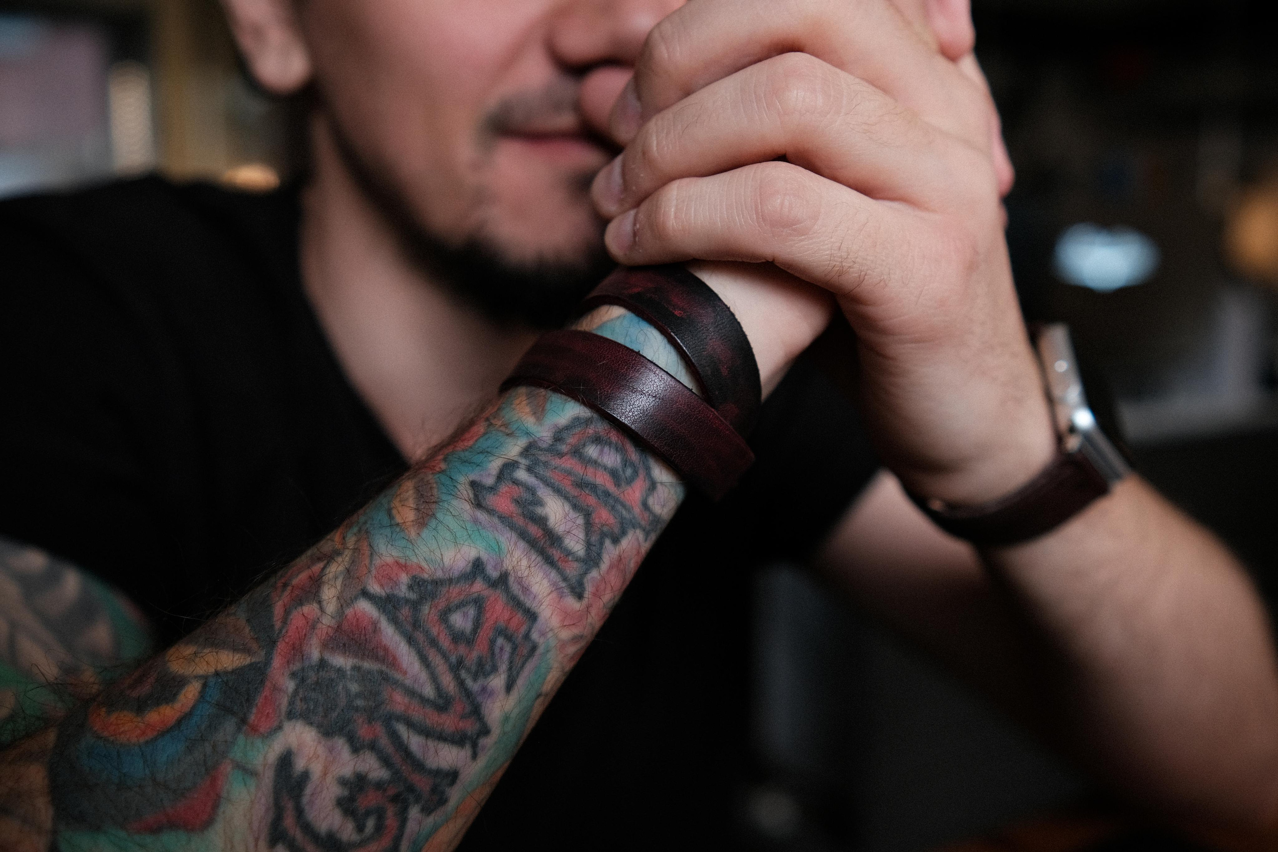 Wrist band bracelet covered in red paint.