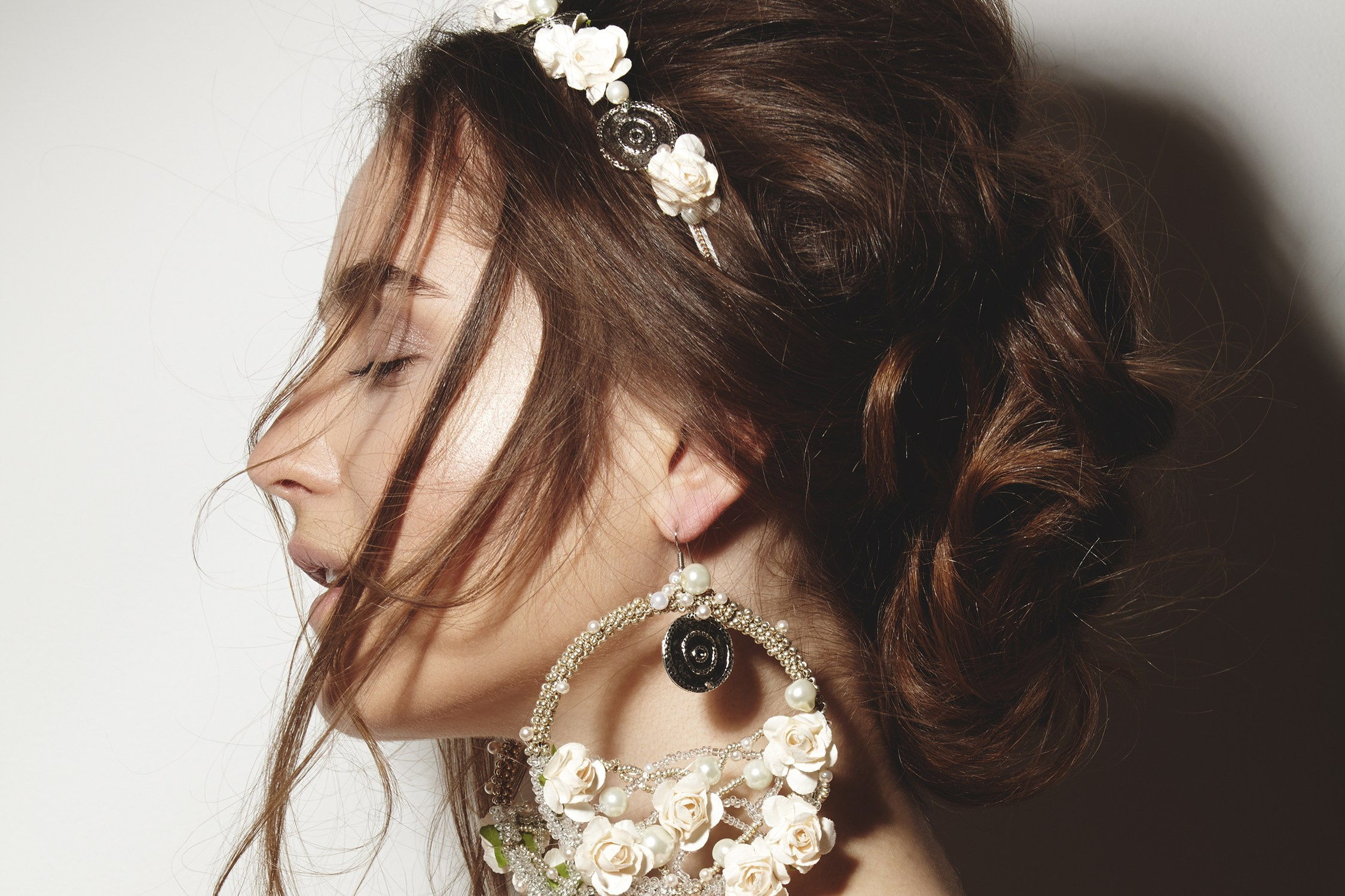 Beauty shot with elegant white accessories by Marina Frost