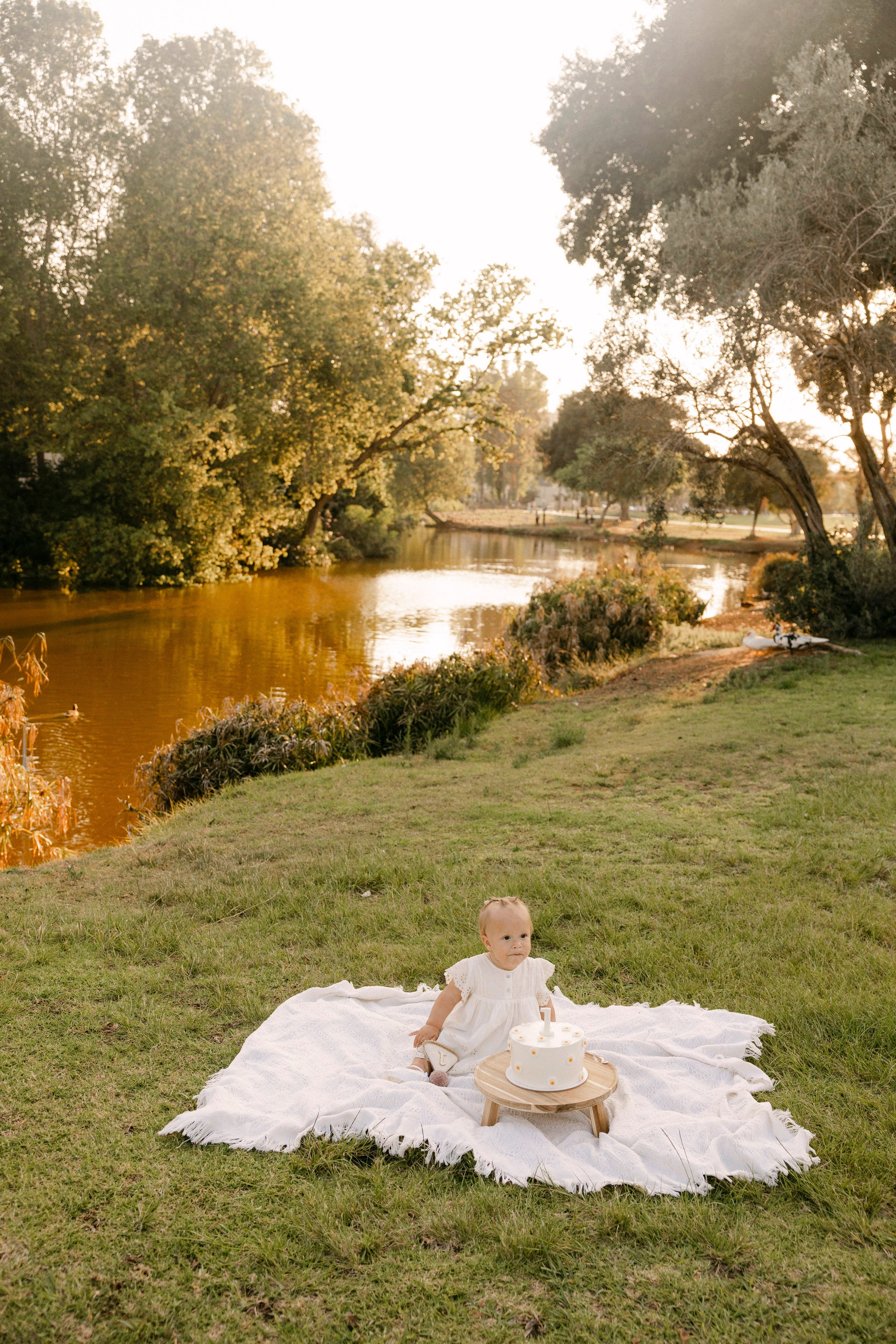 First year photoshoot inside the park (sunset). Wedding and family photographer