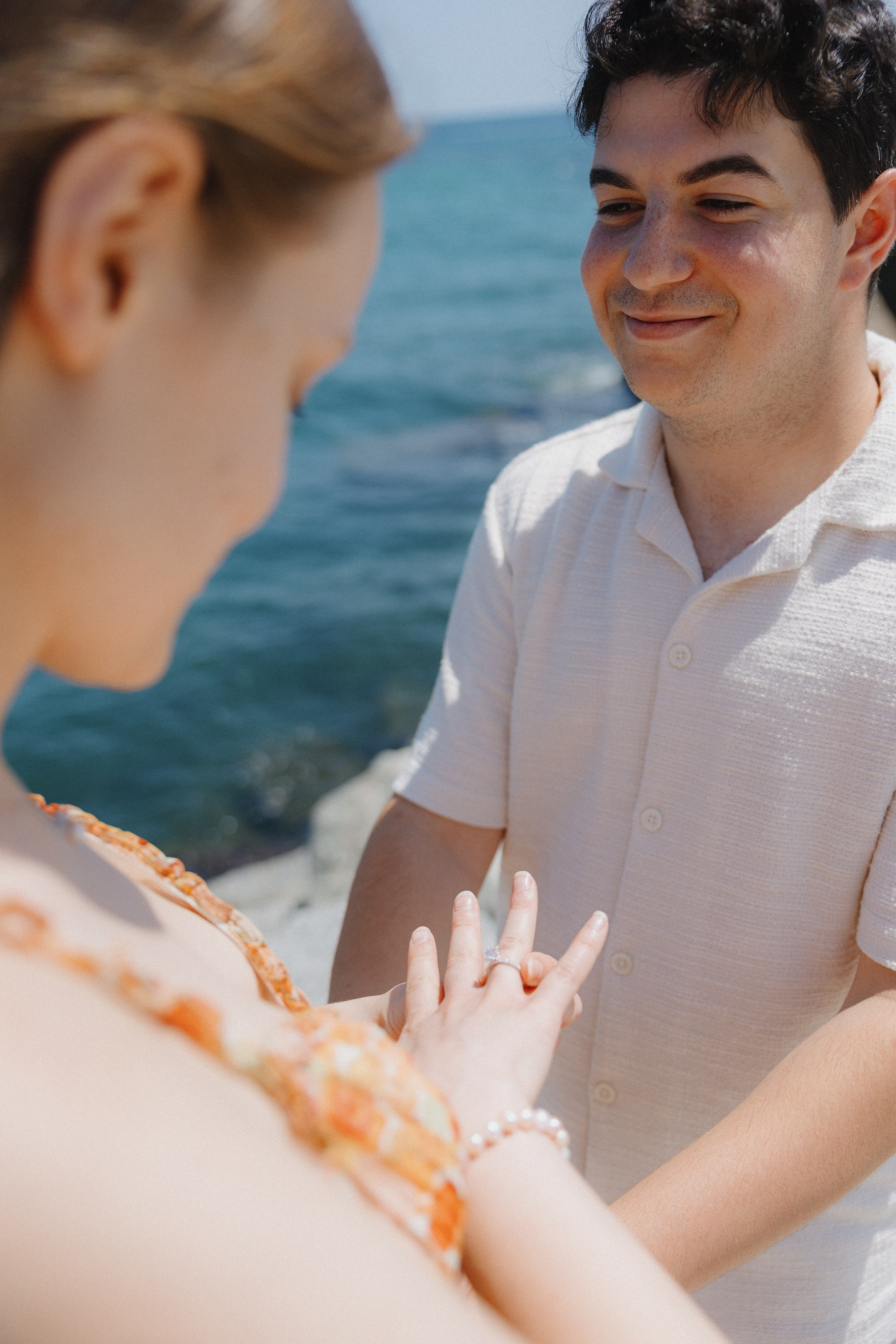 Emotional embrace after marriage proposal in Park Güell