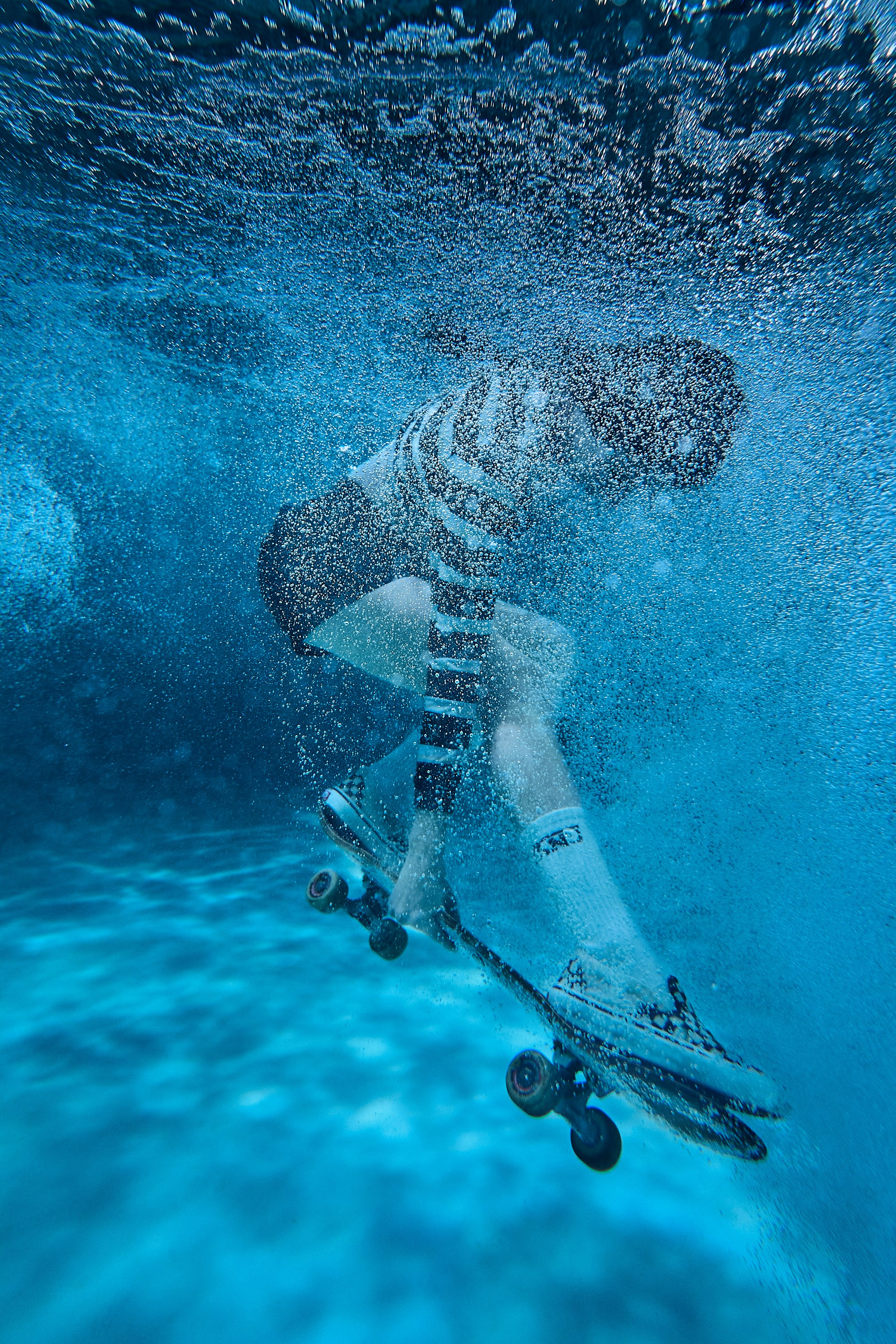 Skate Diving. Creative photographer Denis Klero