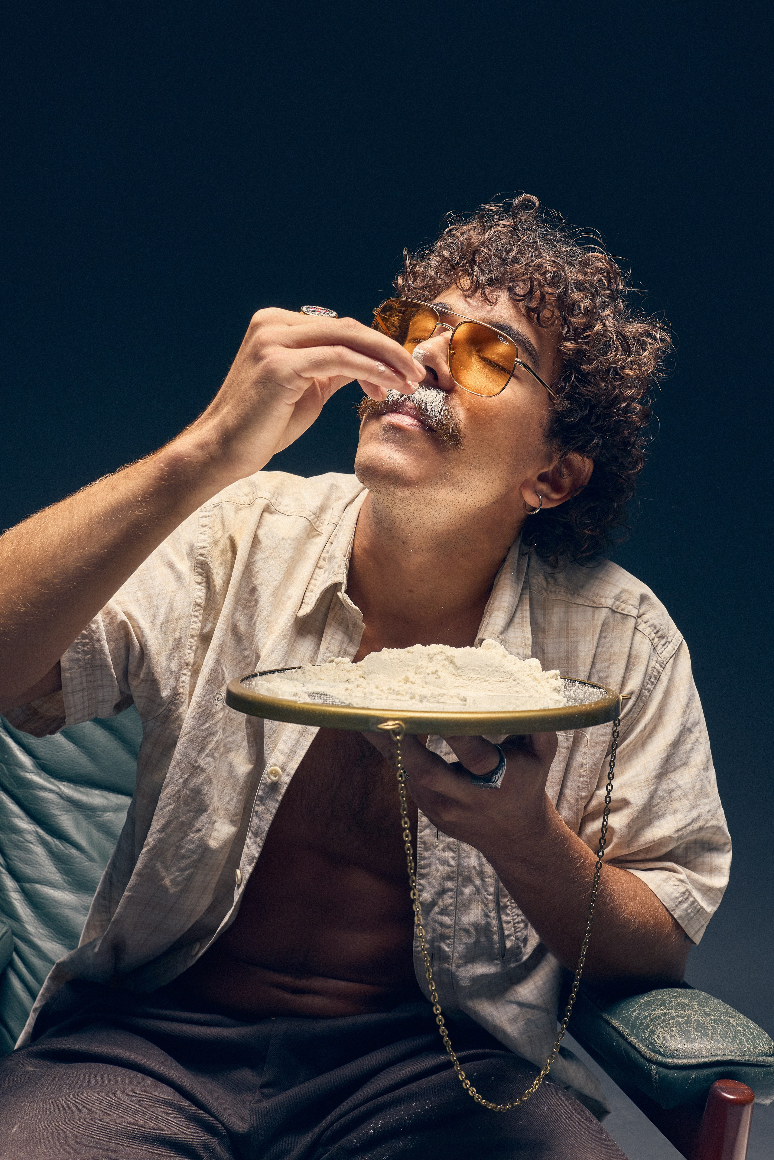 Editorial conceptual portrait with retro accessories