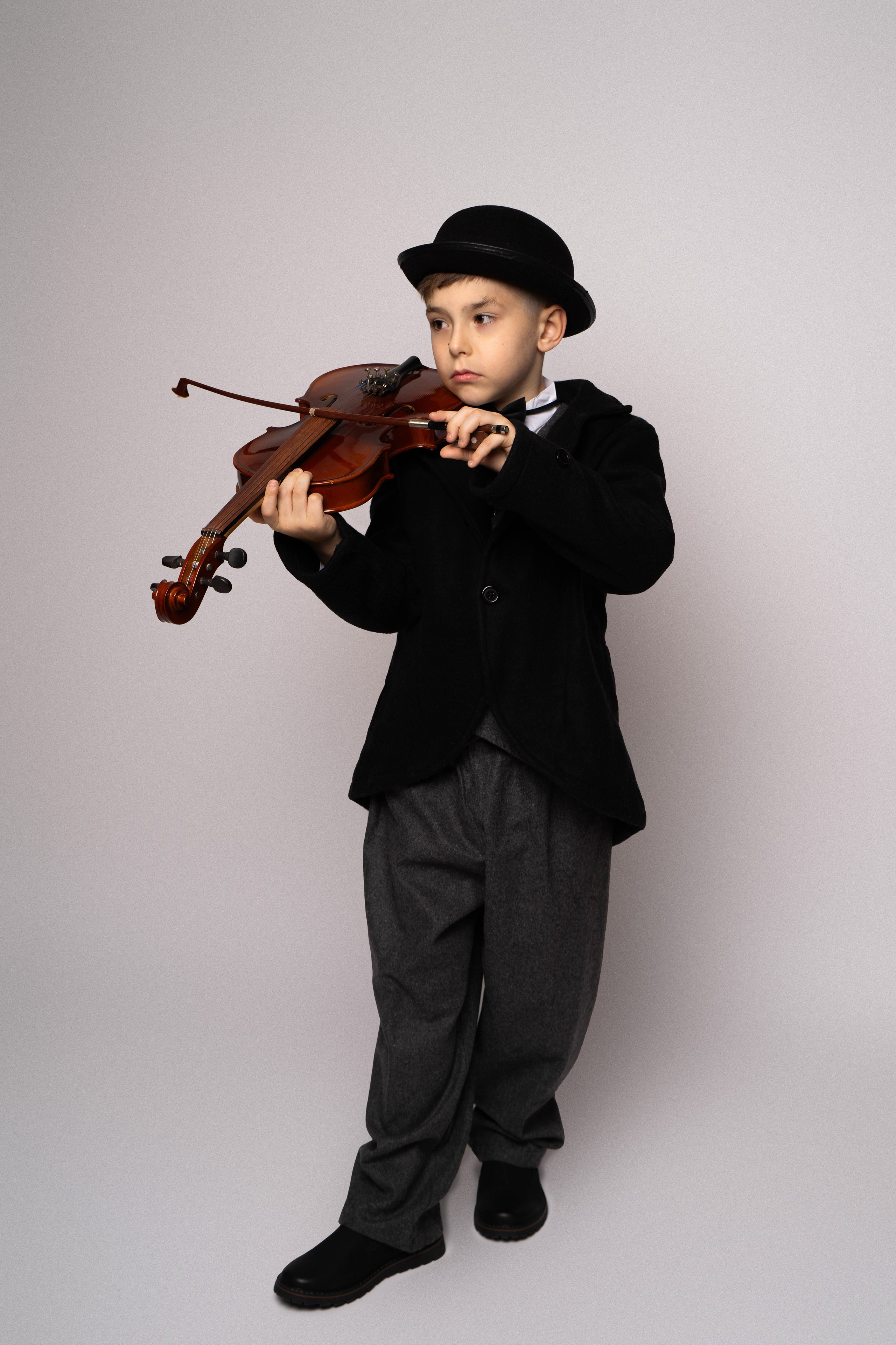 Артем в образе Ч. Чаплина. Студия детской фотографии