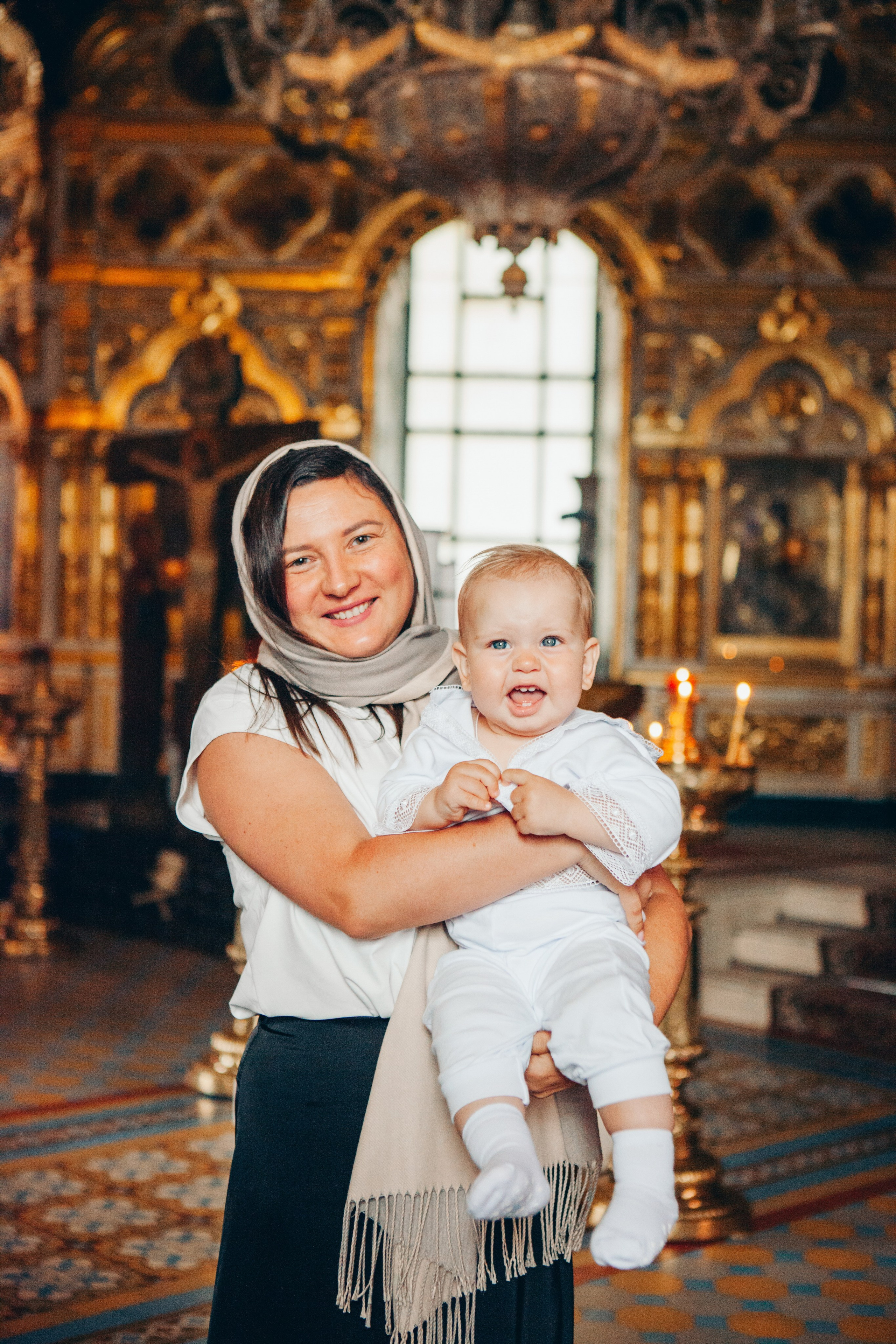 Крещение ребенка в церкви. Фотограф Ольга Ефремова