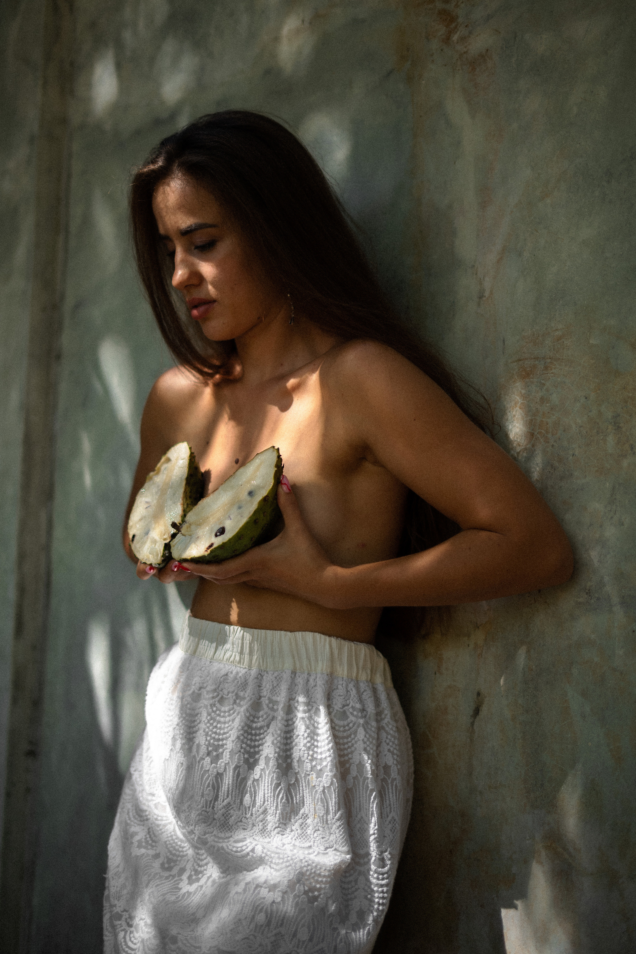 half-naked girl among watermelons