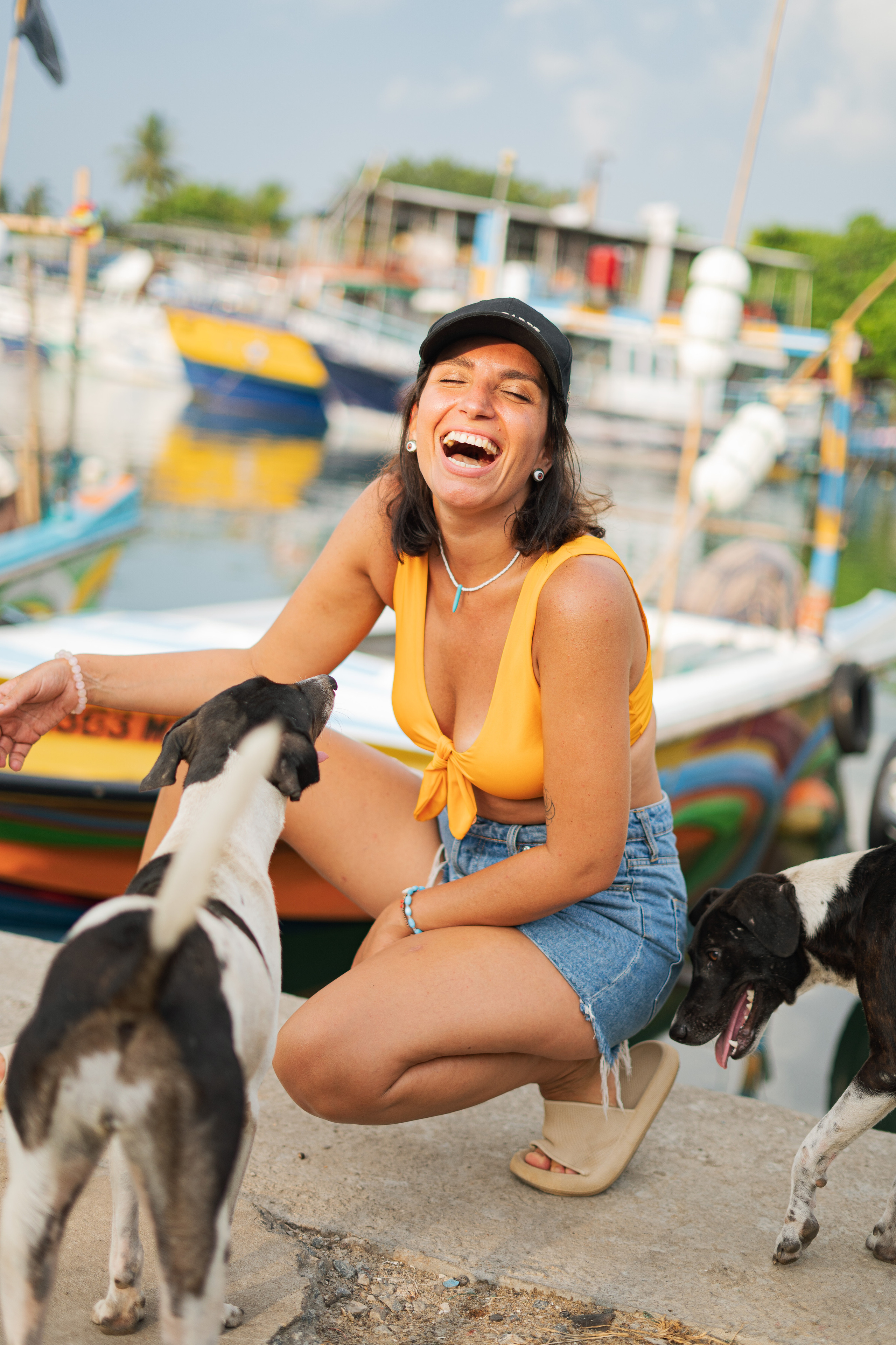 girl at the port with dogs
