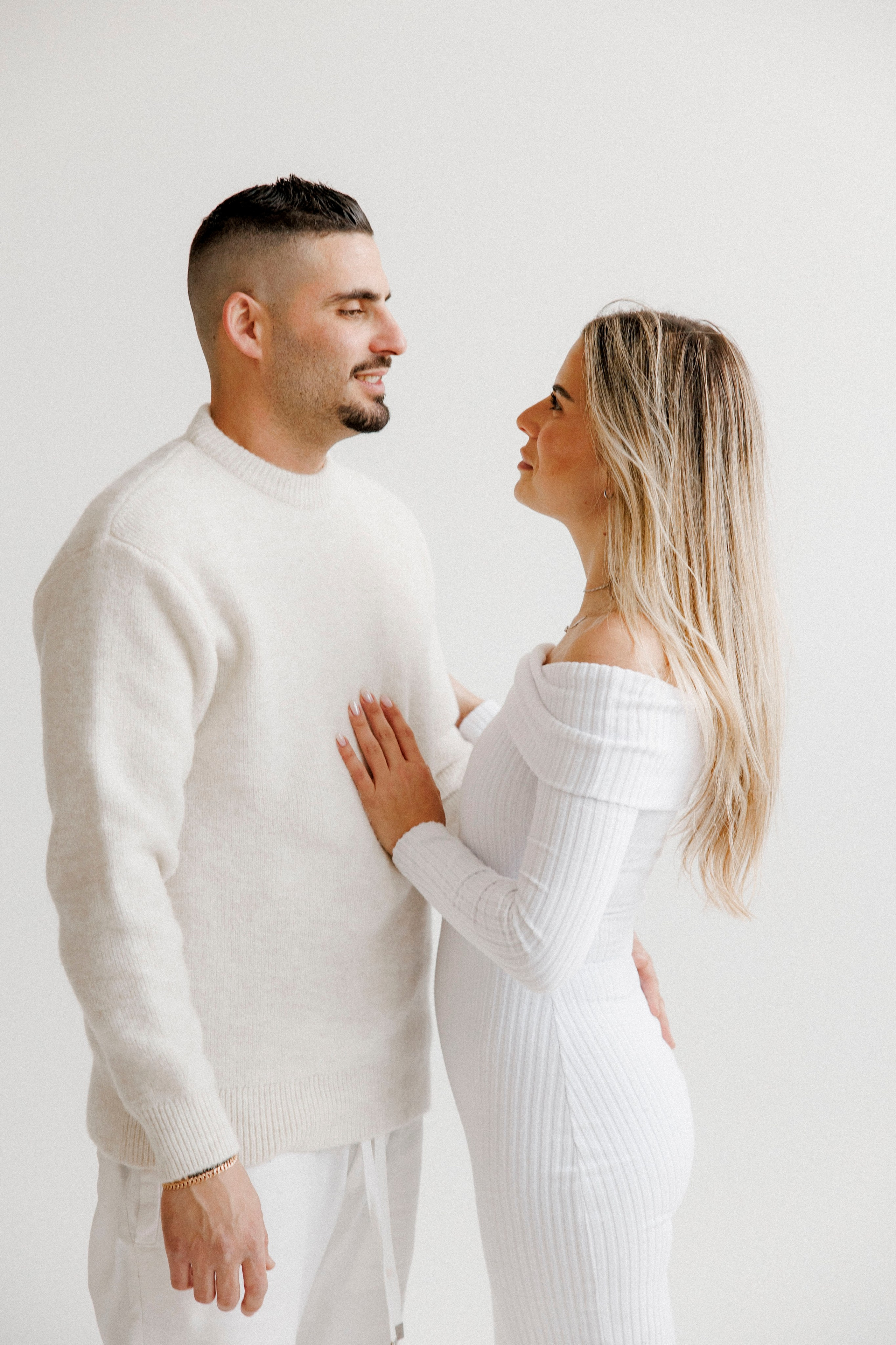 Family photoshoot in White Studio. Wedding and family photographer