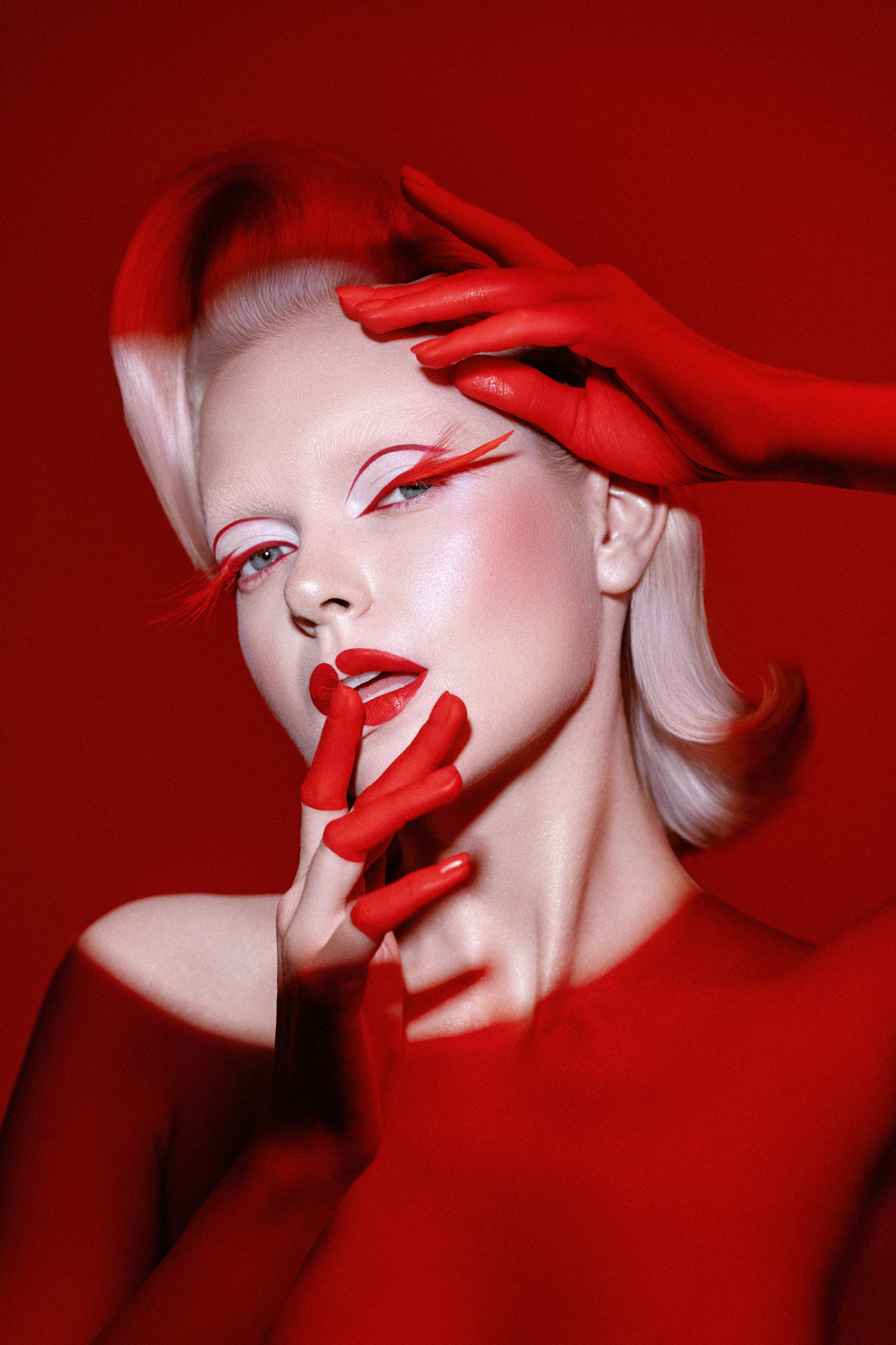 #FashionPhotography #EditorialShoot #CreativeMakeup #AvantGardeStyle #HighFashion #BeautyPortrait #ArtPhotography #RedAesthetic #RetroGlam #VisualArt #FashionEditorial