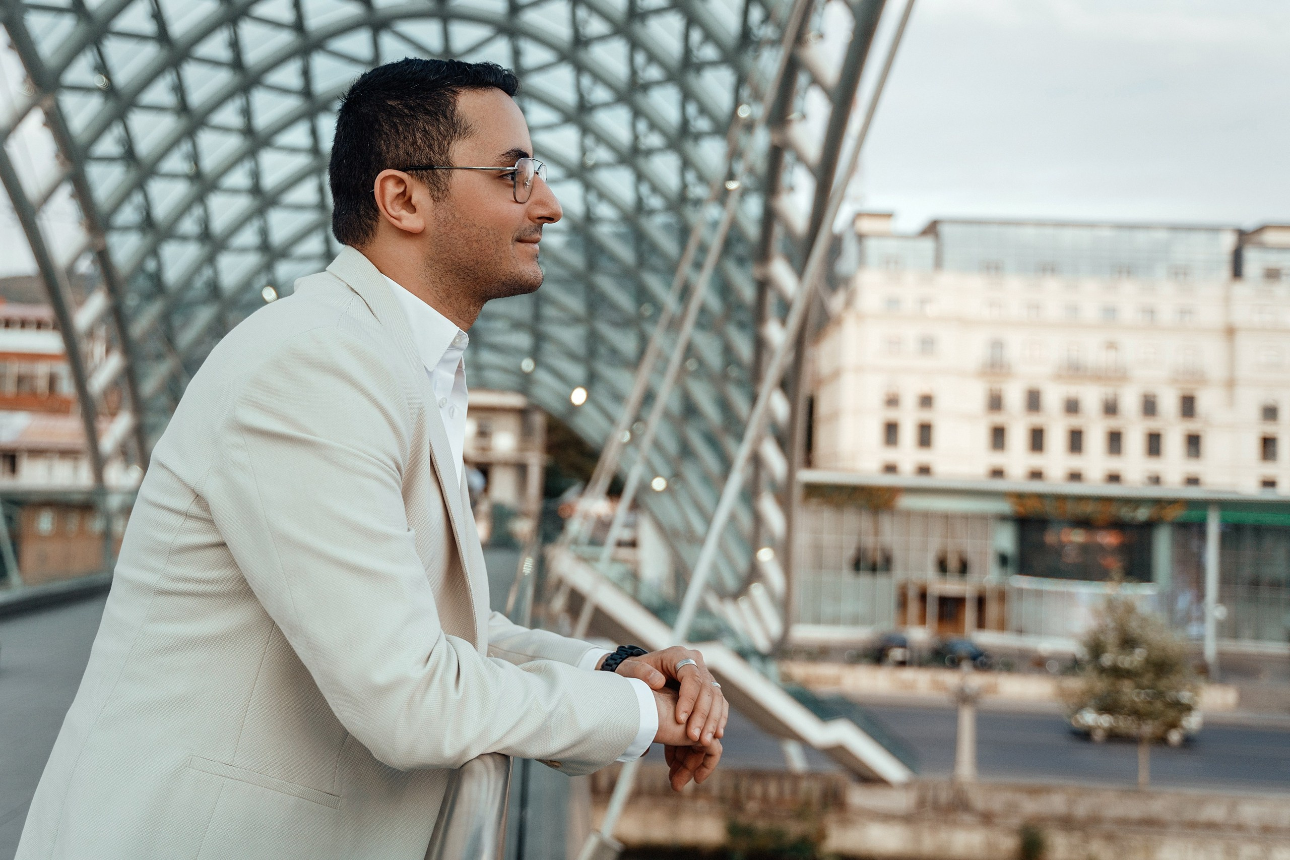 Alaeddine & Matika on the Peace Bridge in Tbilisi. Photographer Sergey Otkrytyi in Batumi & Tbilisi