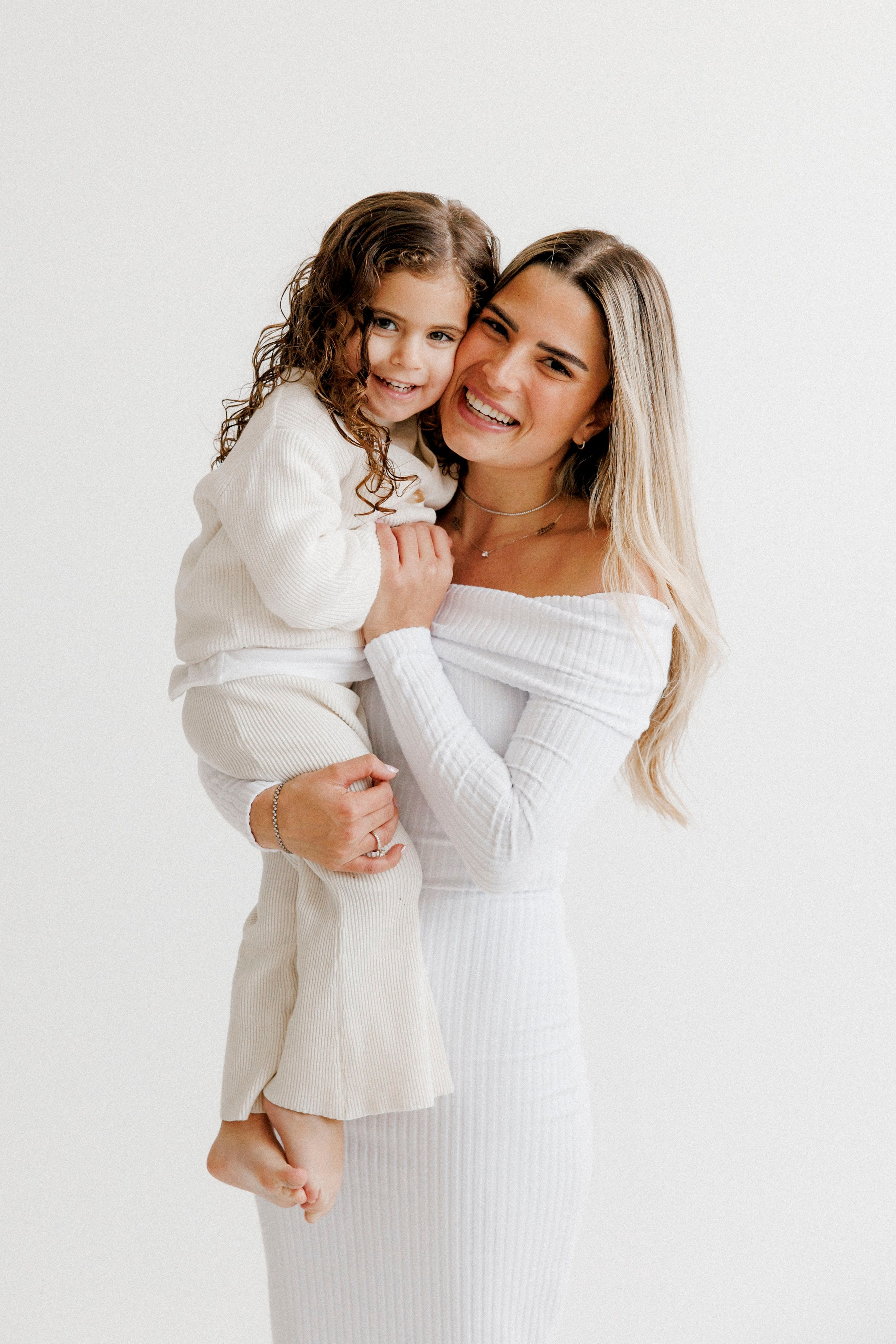 Family photoshoot in White Studio. Wedding and family photographer