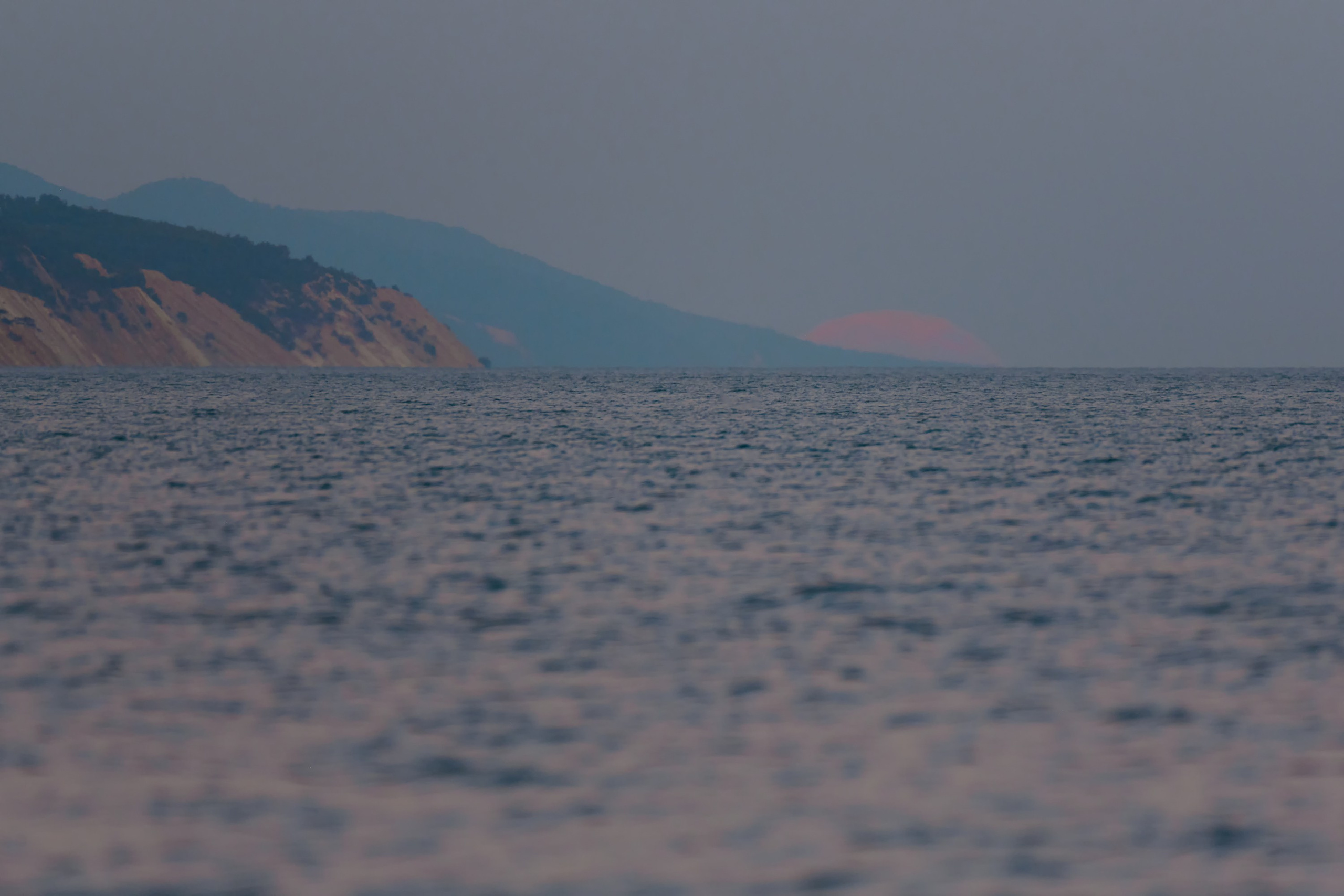 Восход полной Луны из-за мыса Идокопас