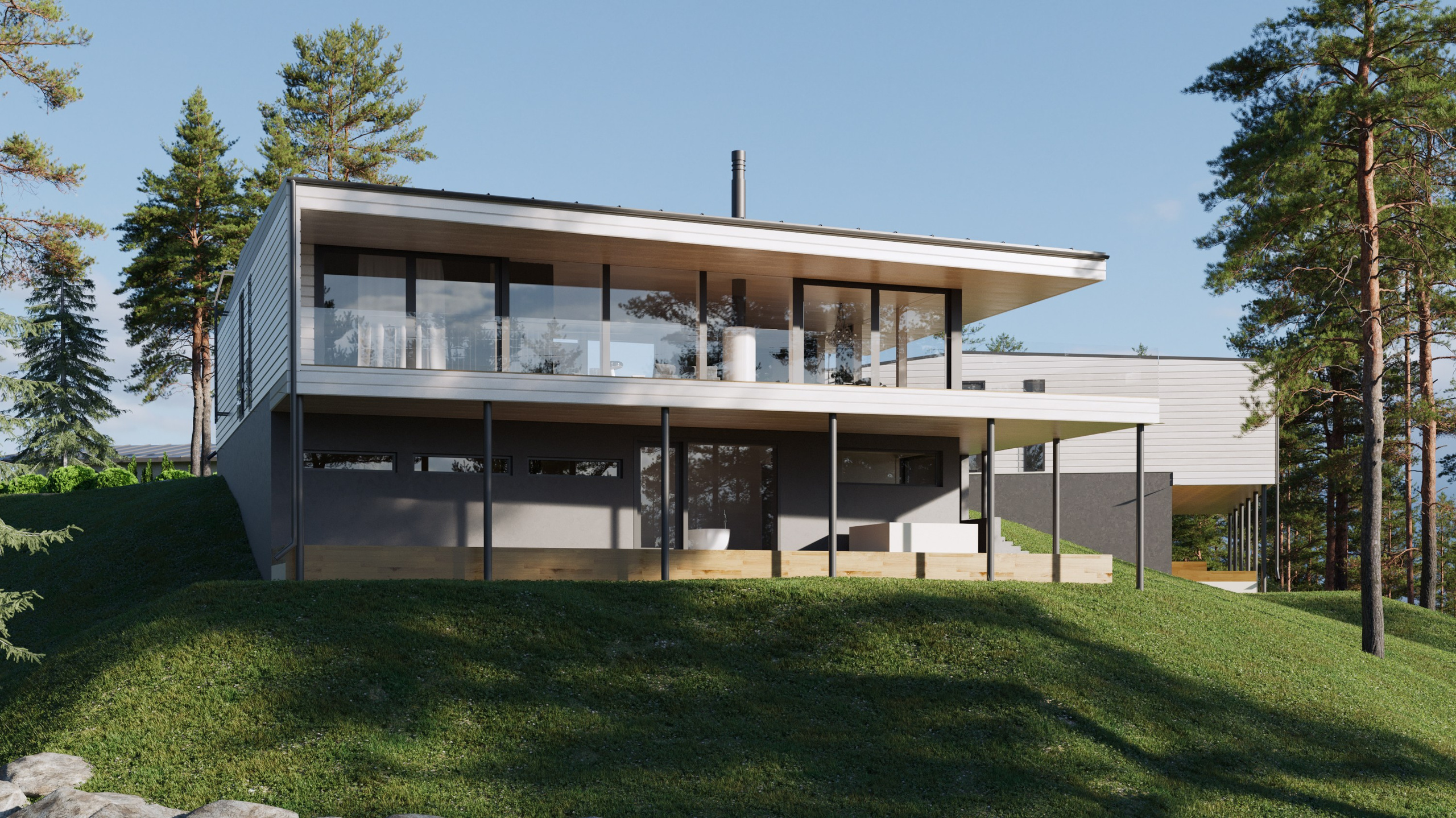 Дом с большими окнами и открытой террасой, построенный на зеленом холме