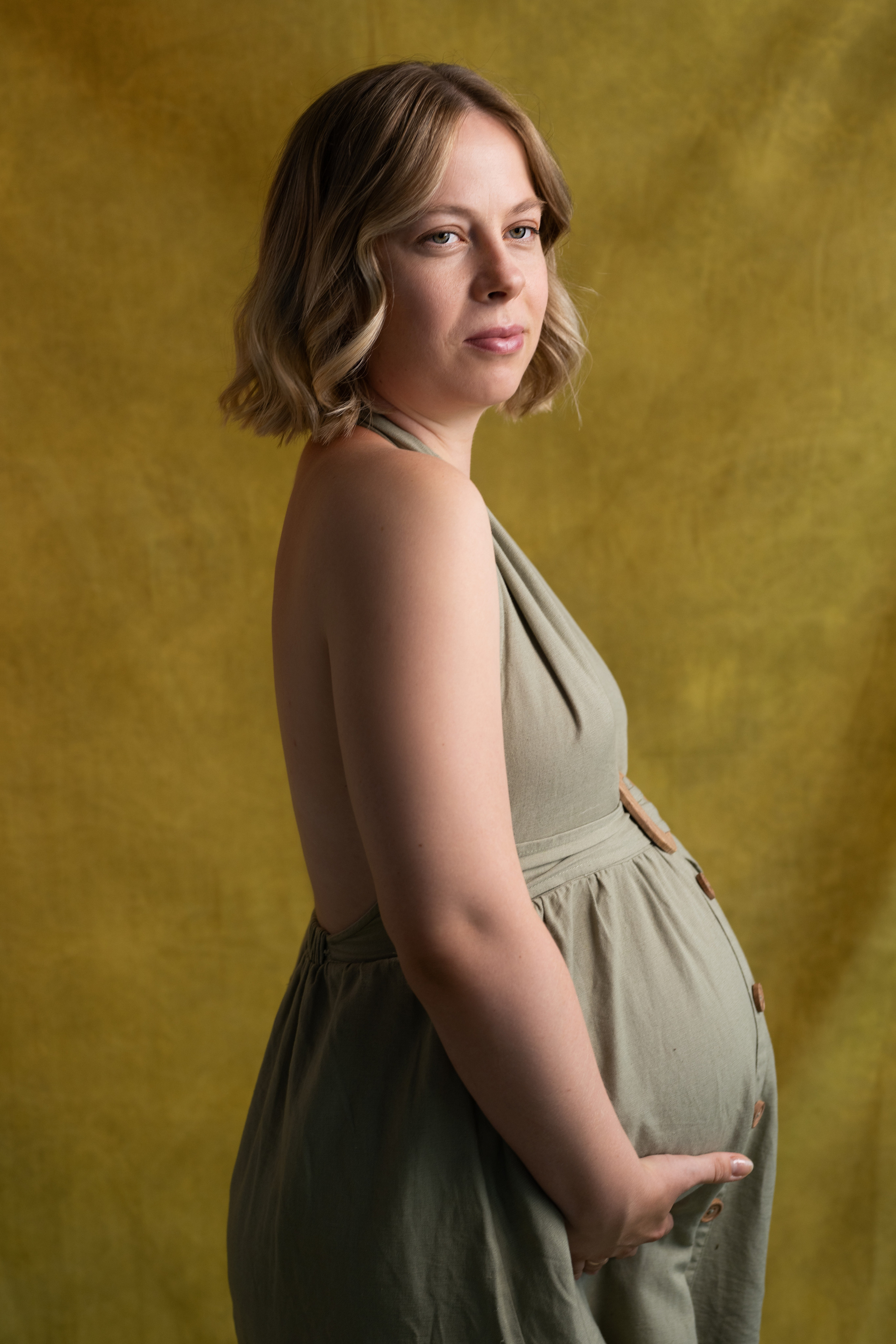 Студийная съёмка беременной девушки