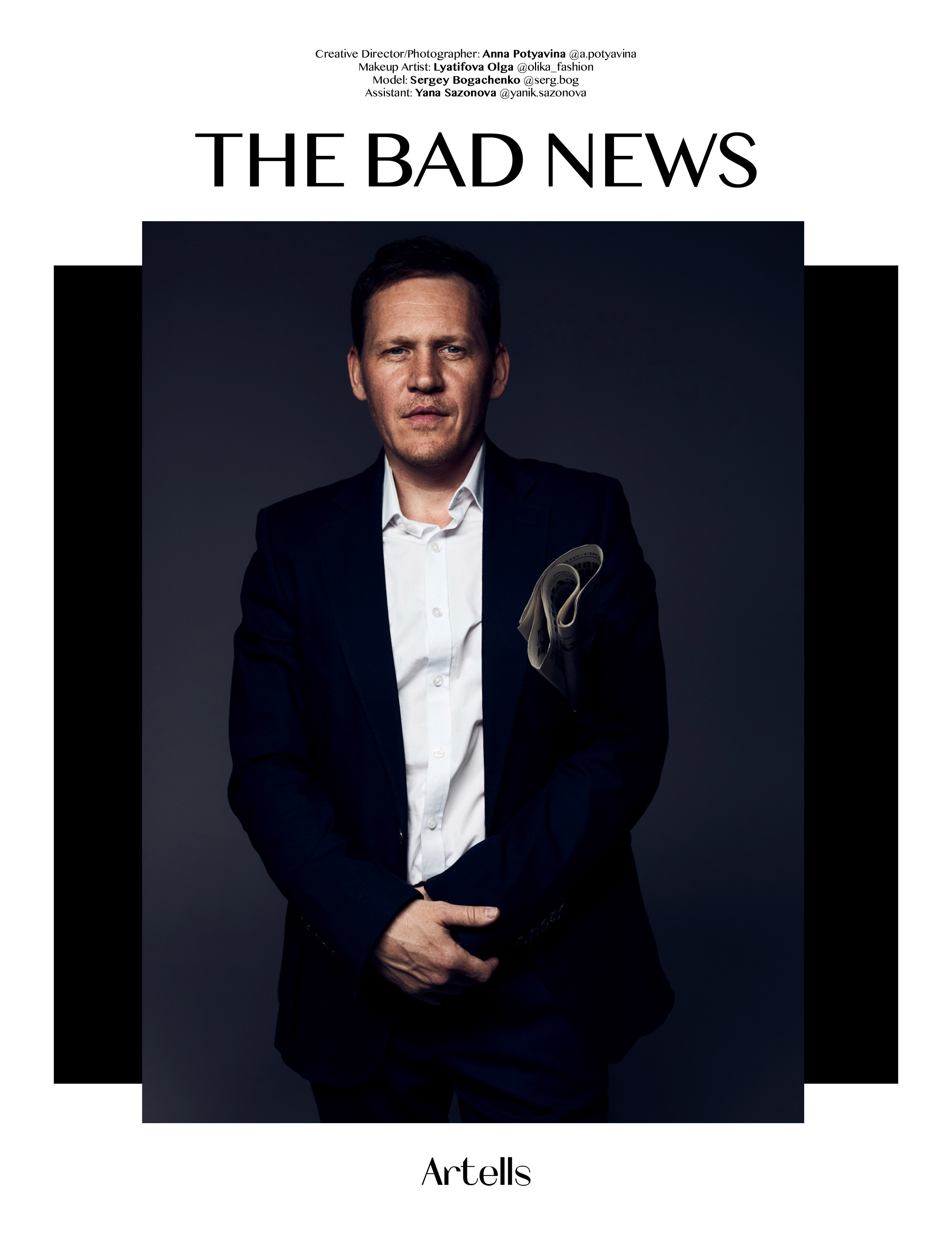 Портрет делового мужчины в белой рубашке с газетой под мышкой