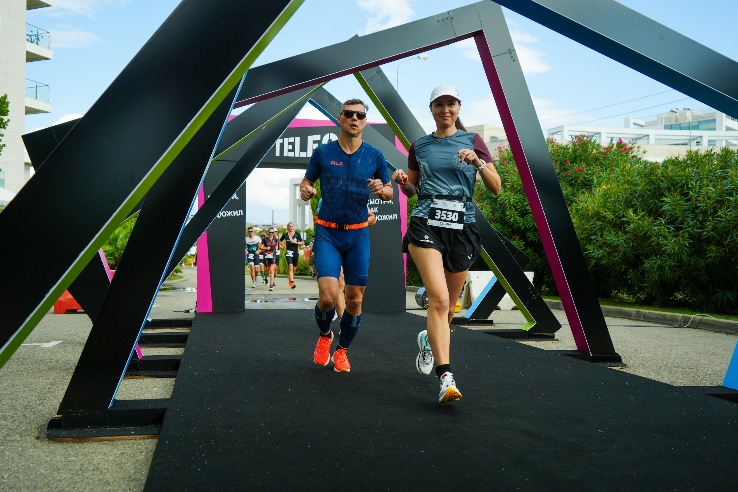 Фотоотчет партнерской интеграции для компании TELE2 на фестивале Ironstar. Репортажный фотограф в Красной Поляне и Сочи Павлюченко Екатерина