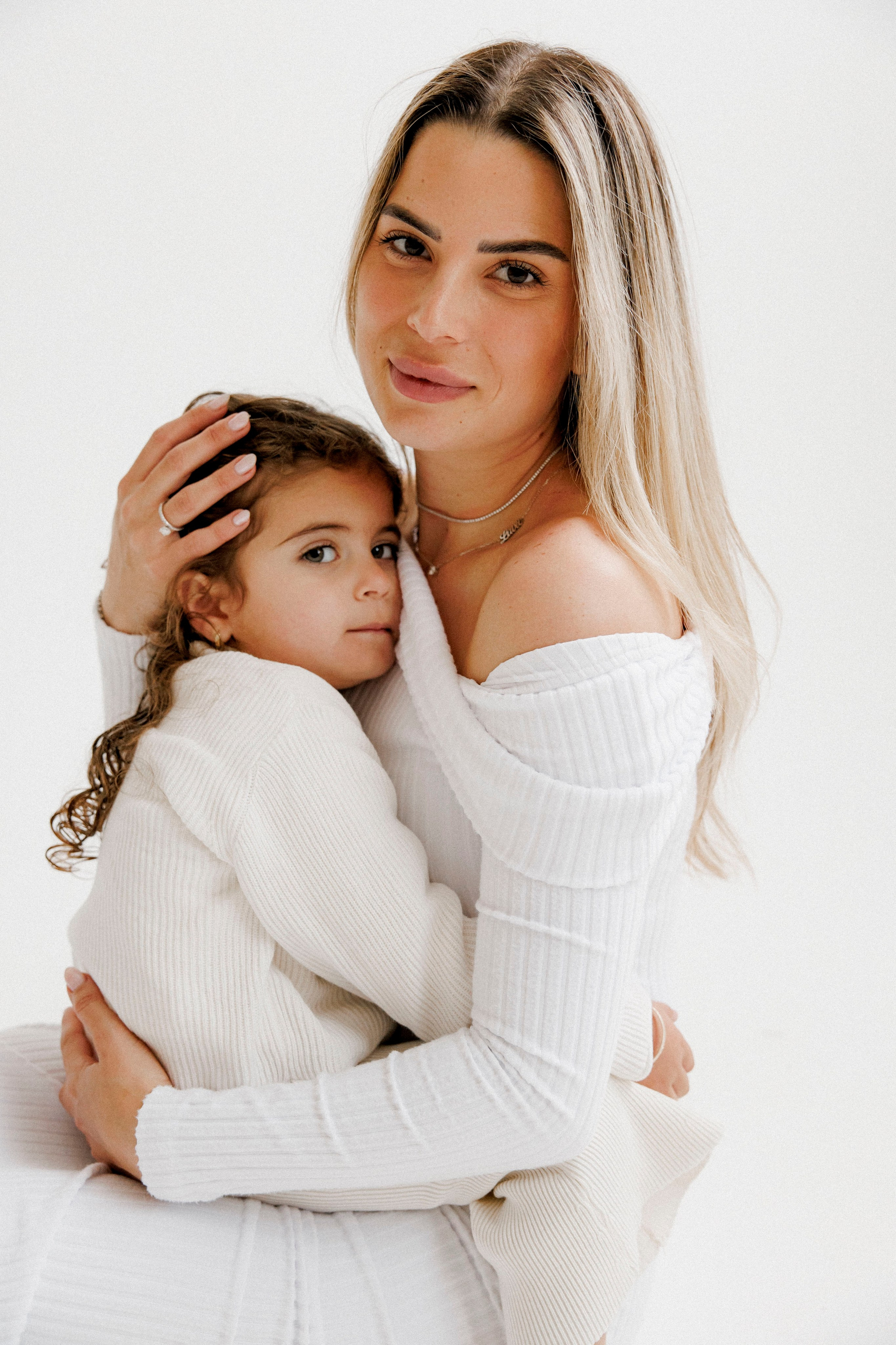 Family photoshoot in White Studio. Wedding and family photographer