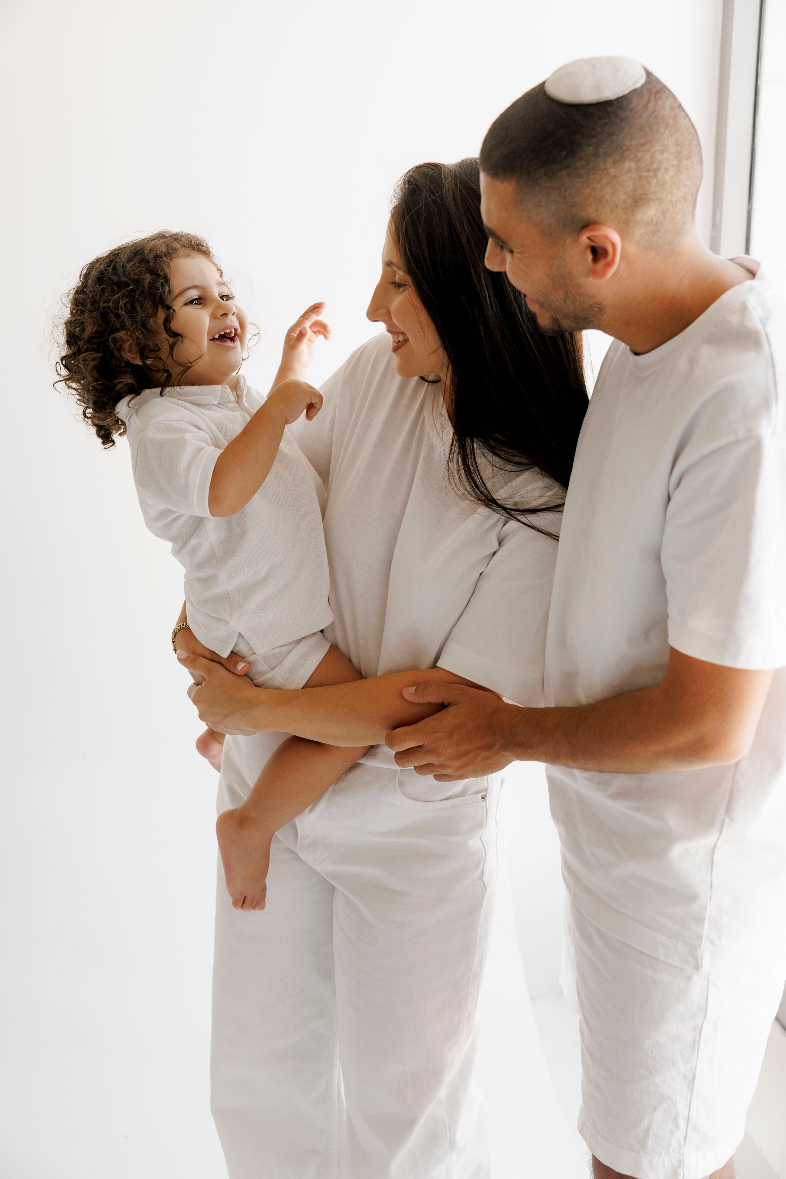 Family photoshoot inside the studio in Hadera. Wedding and family photographer