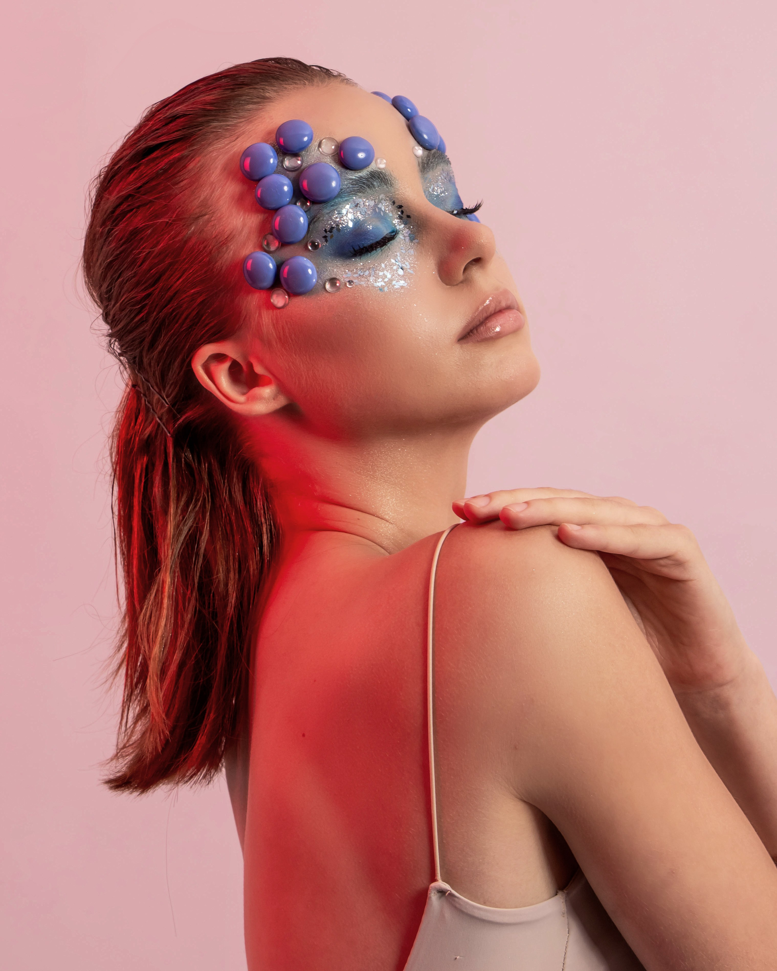 "portrait photo with make up I adding  red color lights n studio ".