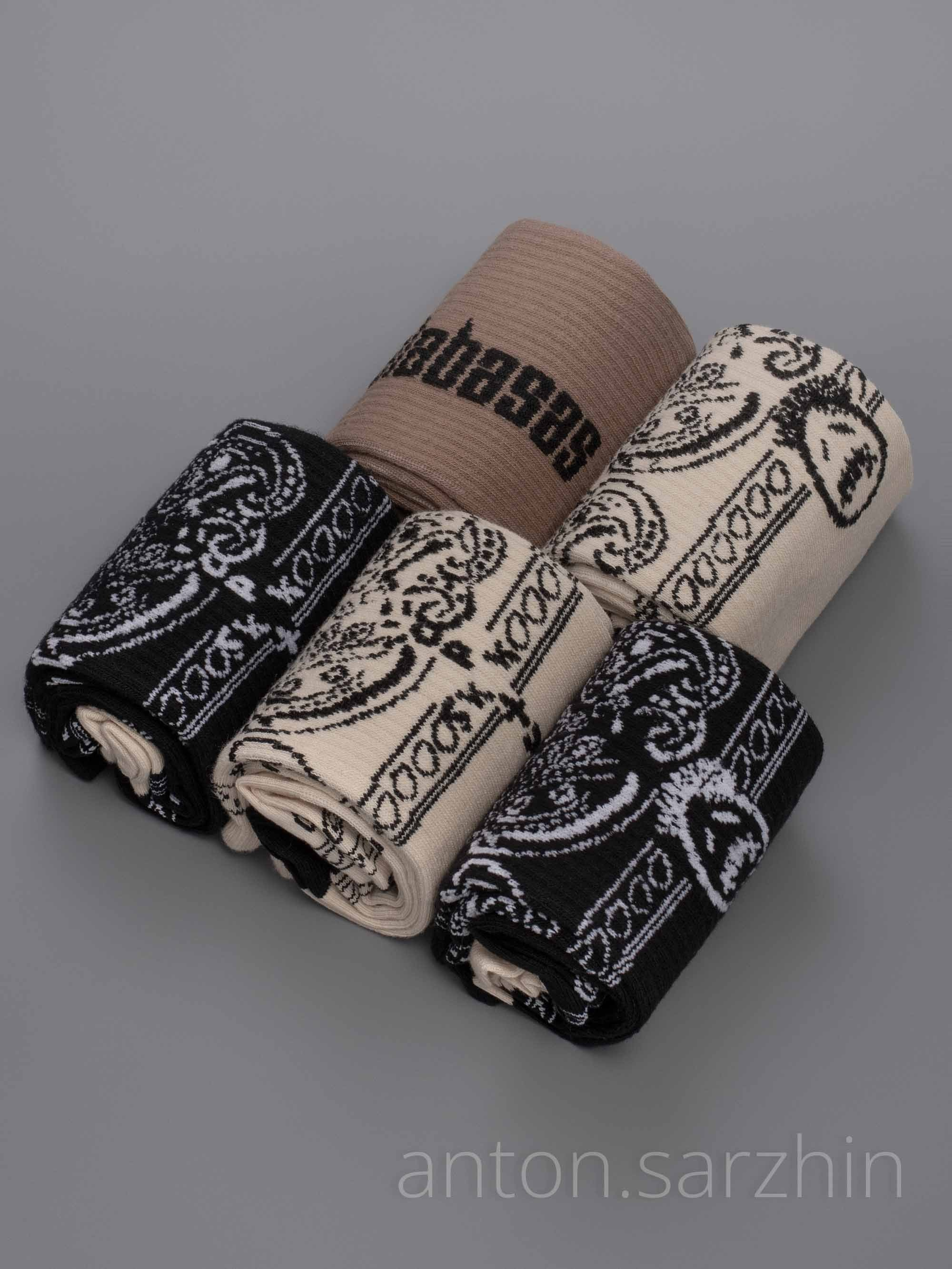 Предметное фото скрученных носков