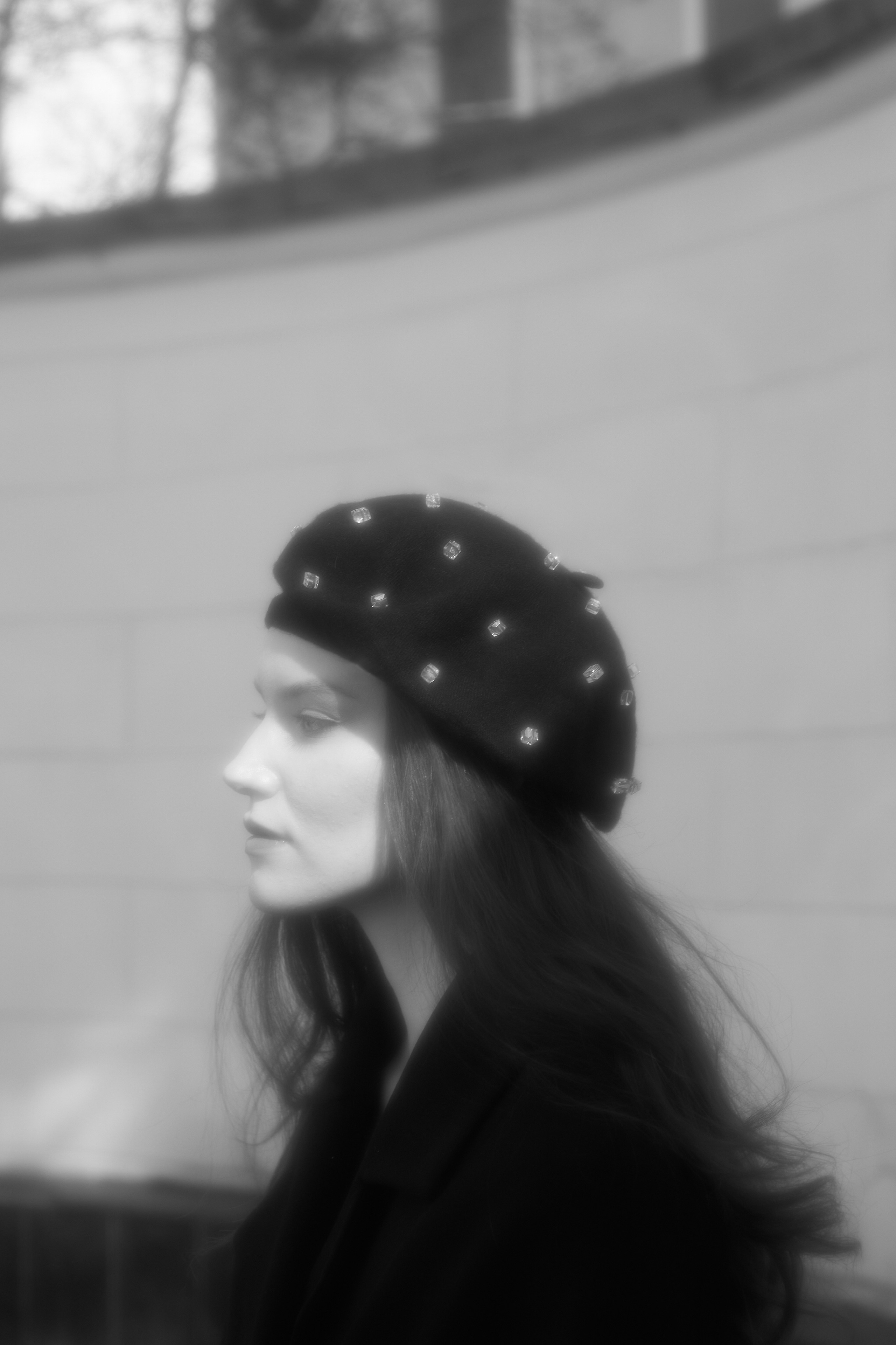 Black coat walking. Fashion Photographer Oxana Chernomorets