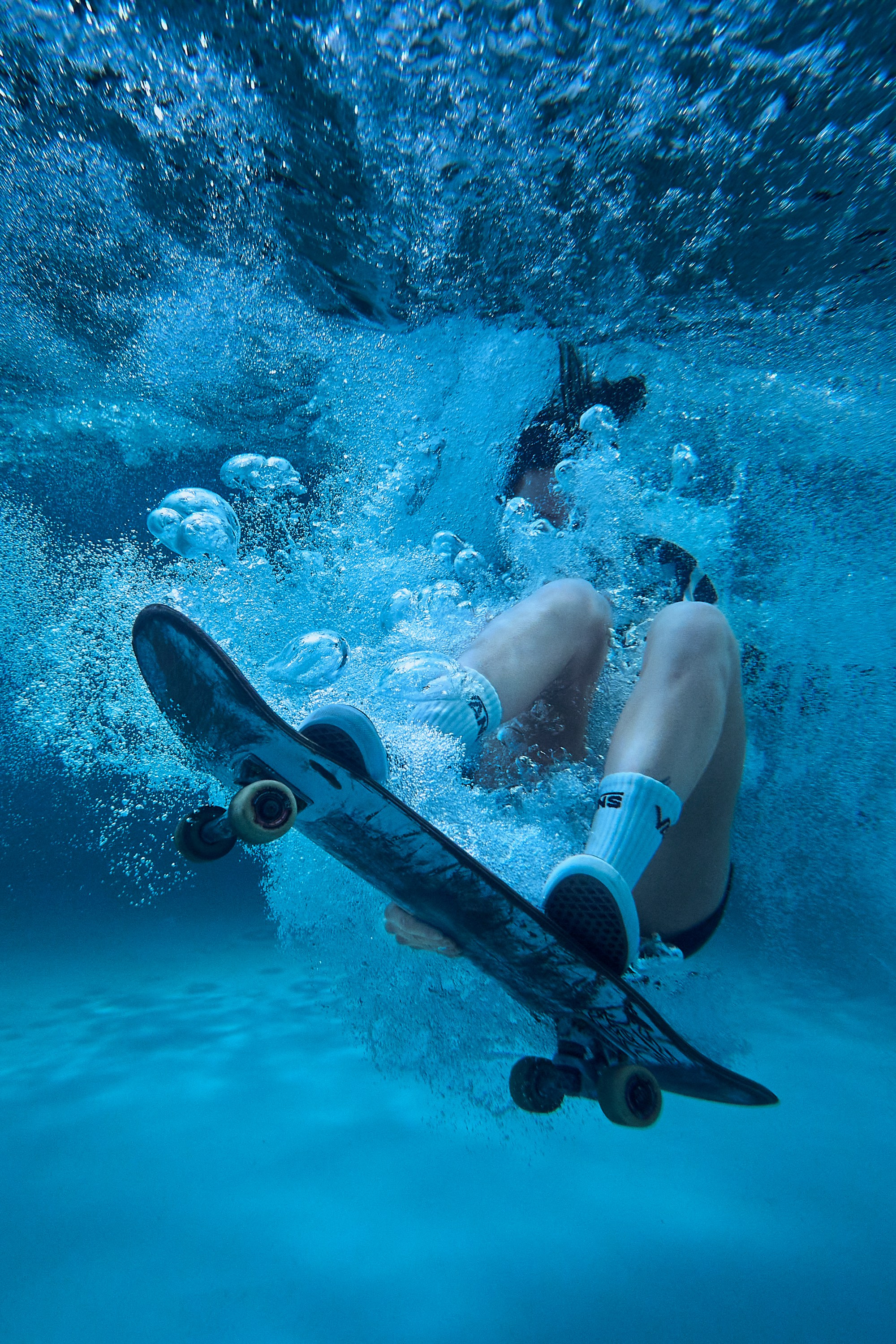 Skate Diving. Creative photographer Denis Klero