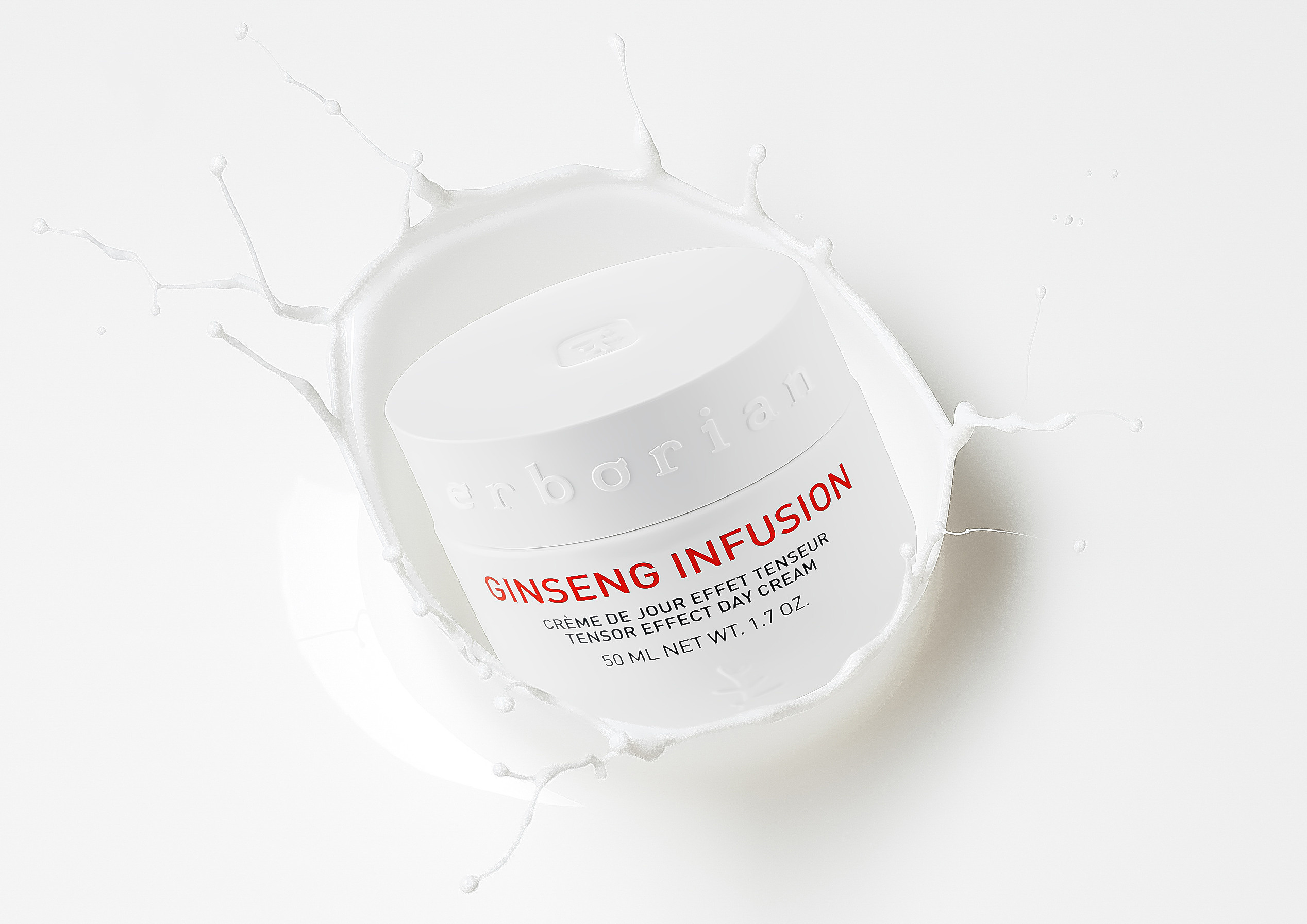 баночка  крема erborian подающая в молоко с брызгами