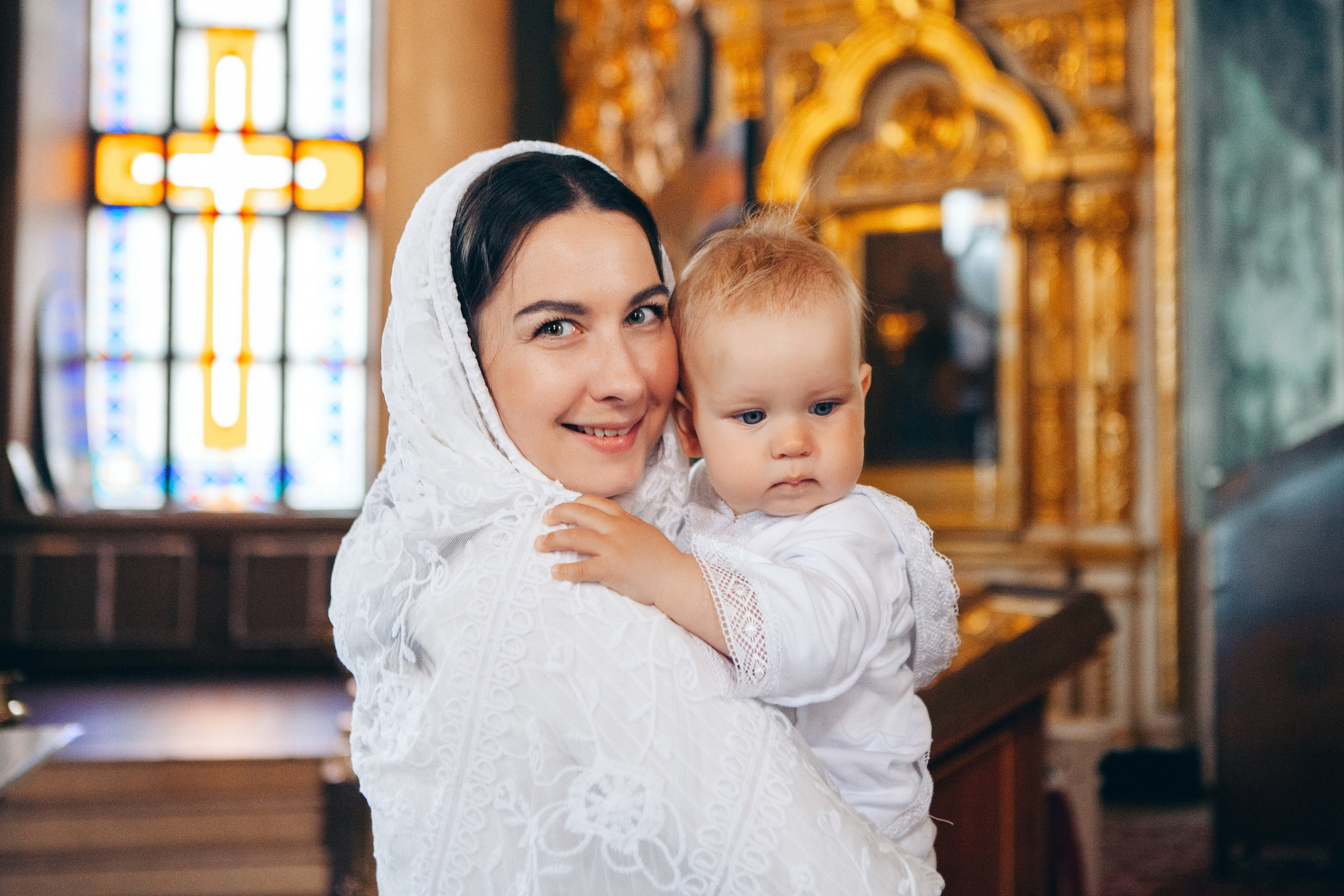 Крещение ребенка в церкви. Фотограф Ольга Ефремова