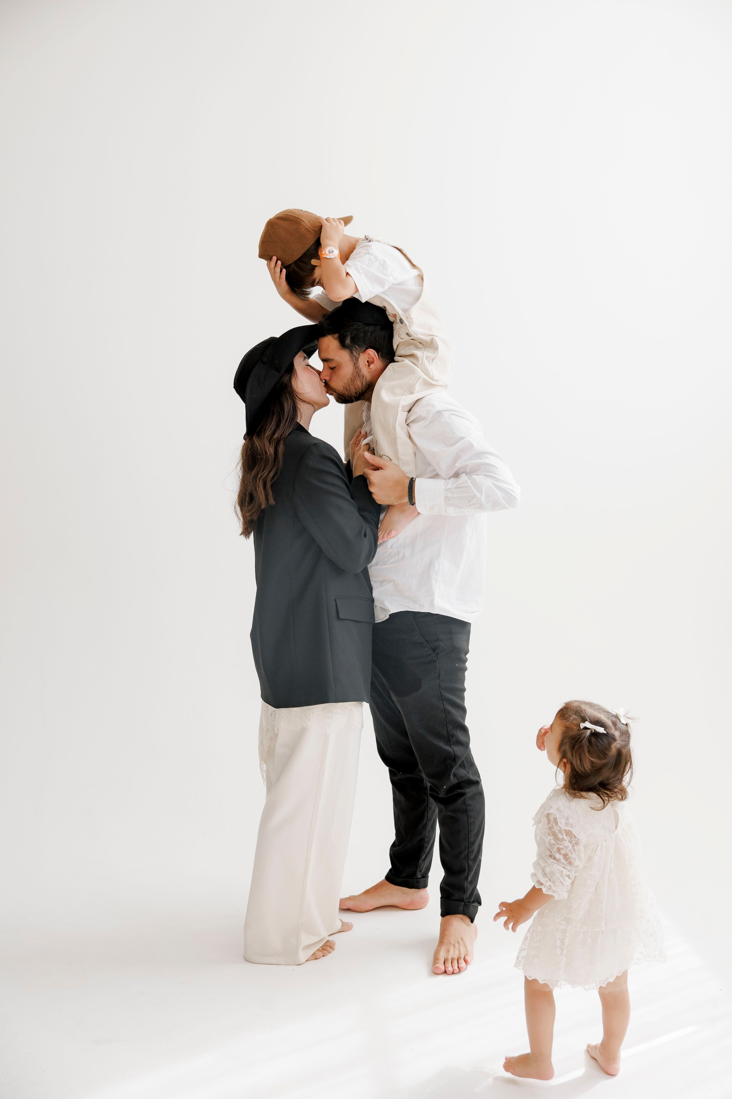 Family photoshoot inside the studio. Wedding and family photographer