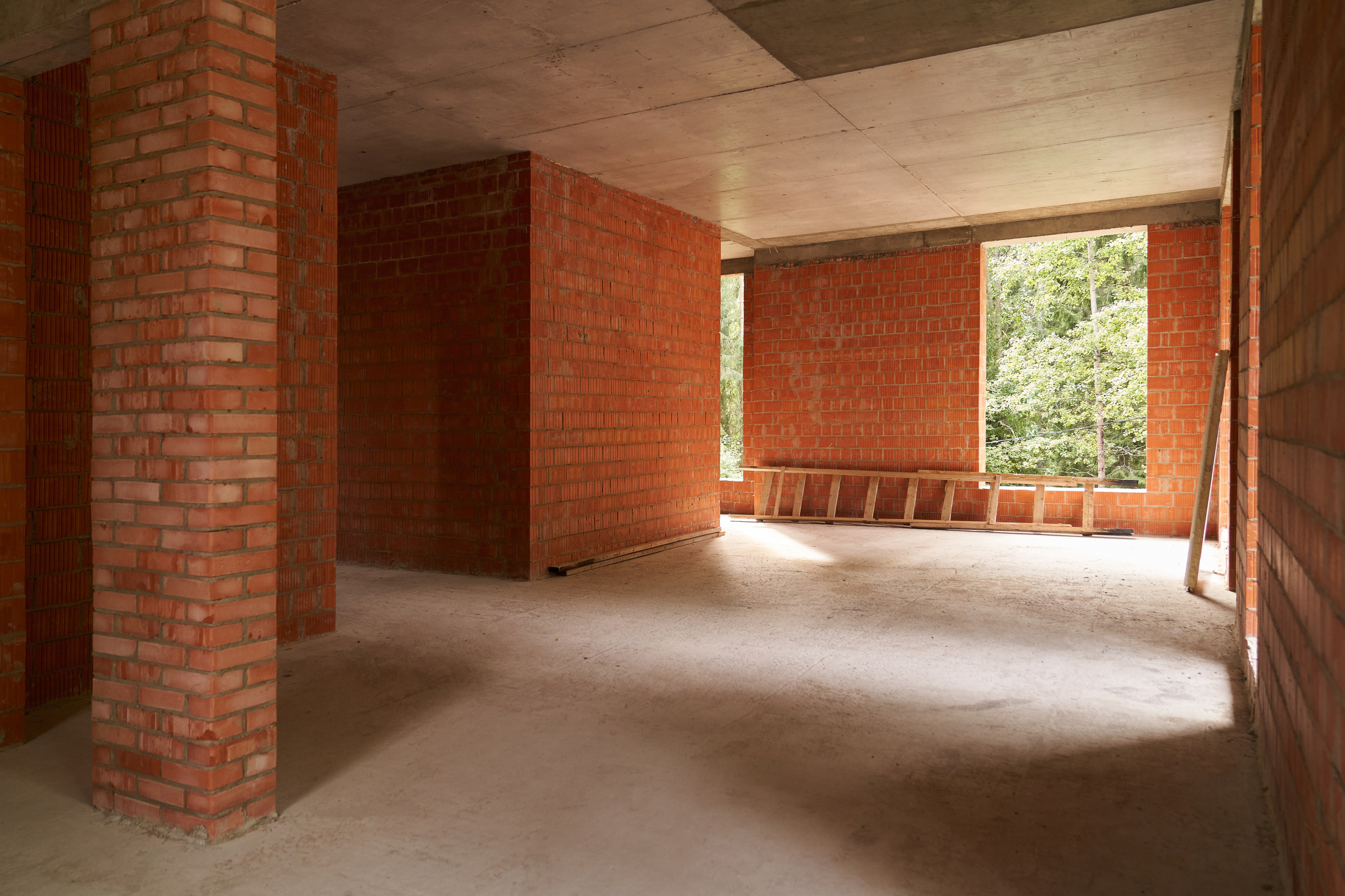 Фотосъёмка строительства дома в Комарово — архитектурный проект на стадии кирпичных работ. Сергей Горшенин — профессиональный фотограф