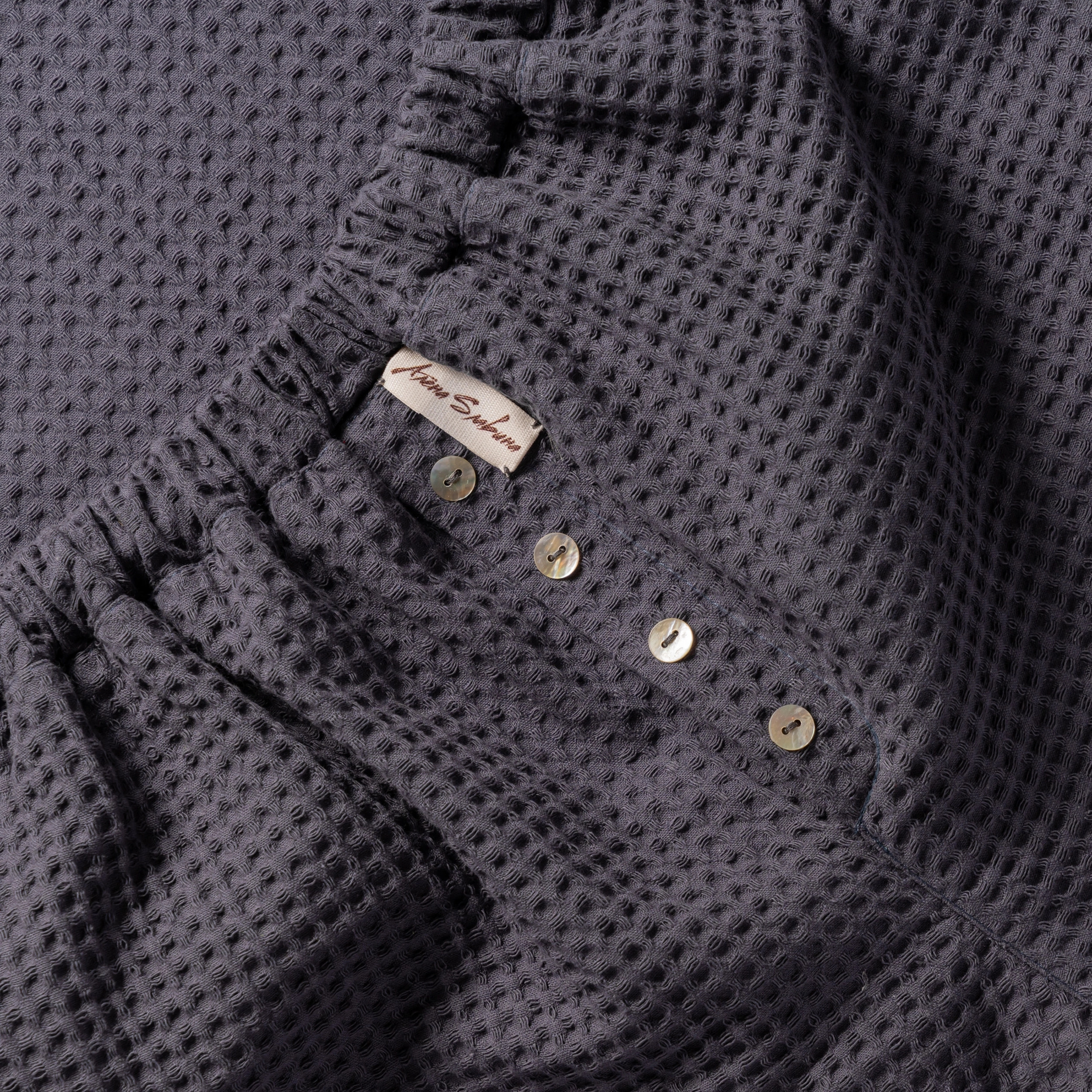 Отделка гульфика пуговицами.