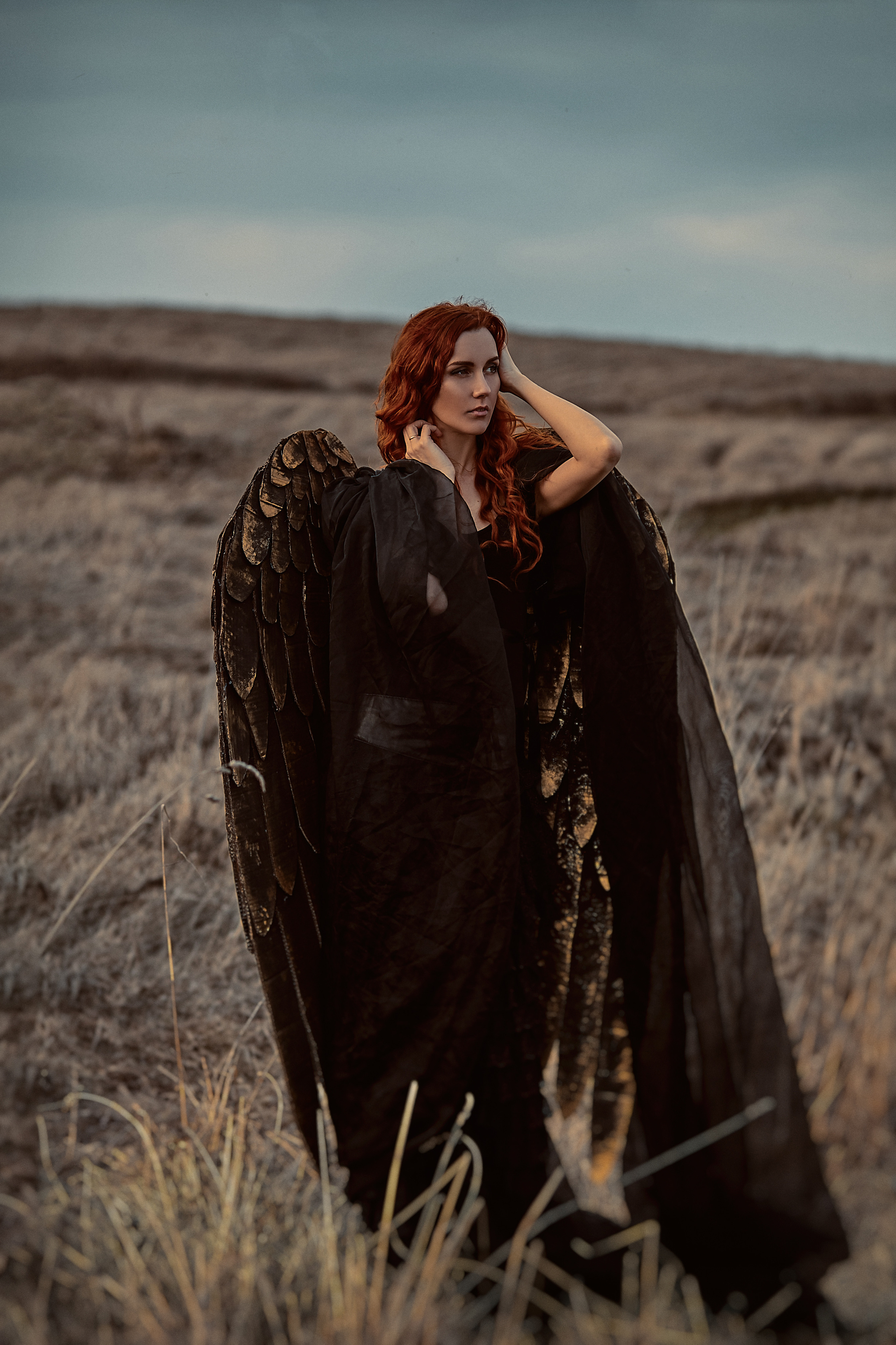 Фотосессия рыжего ангела с черными крыльями. Рекламный фотограф Санкт-Петербург Катерина Мишкель