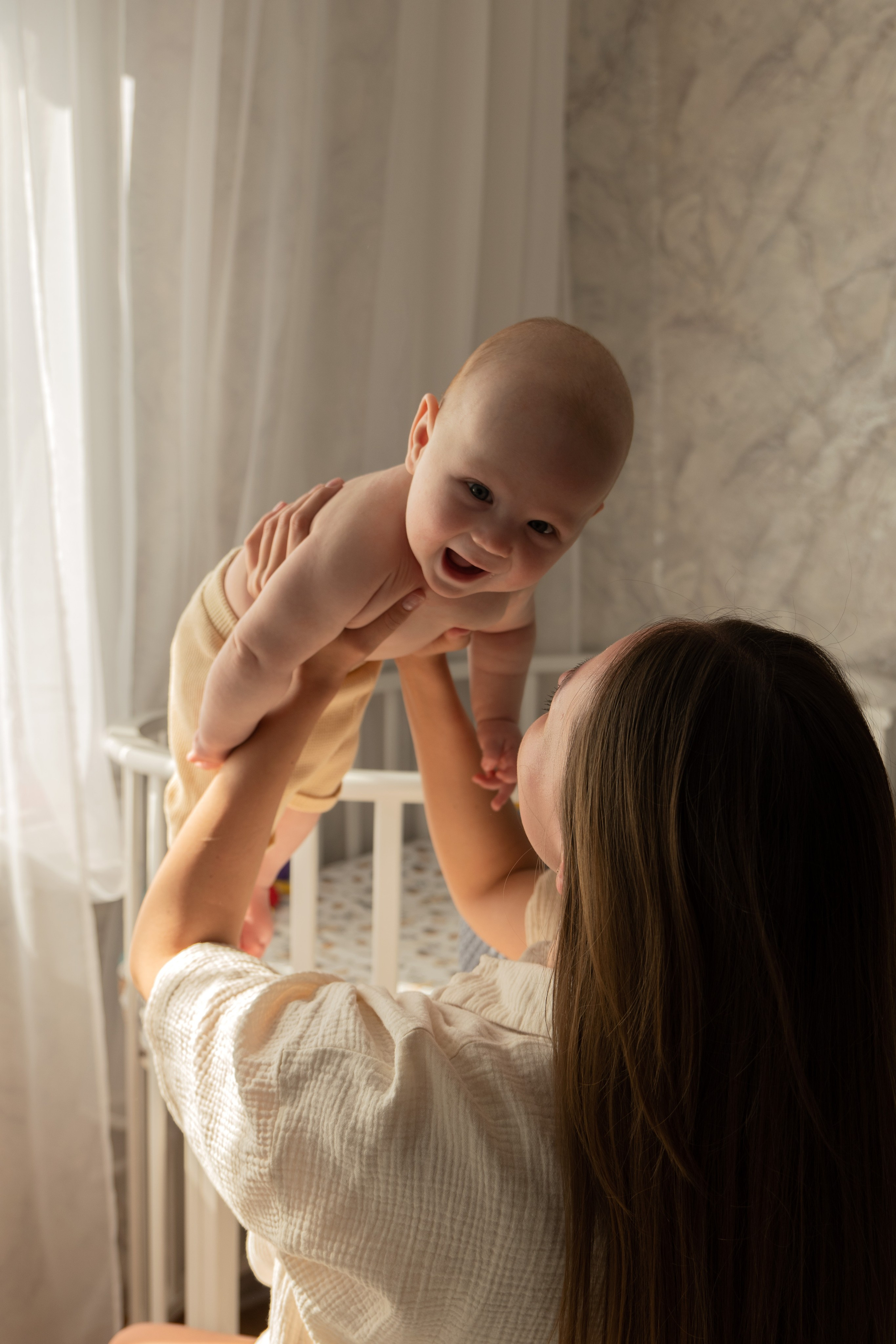 Мама и малыш (5 месяцев). Фотограф видеограф Ольга Василевская
