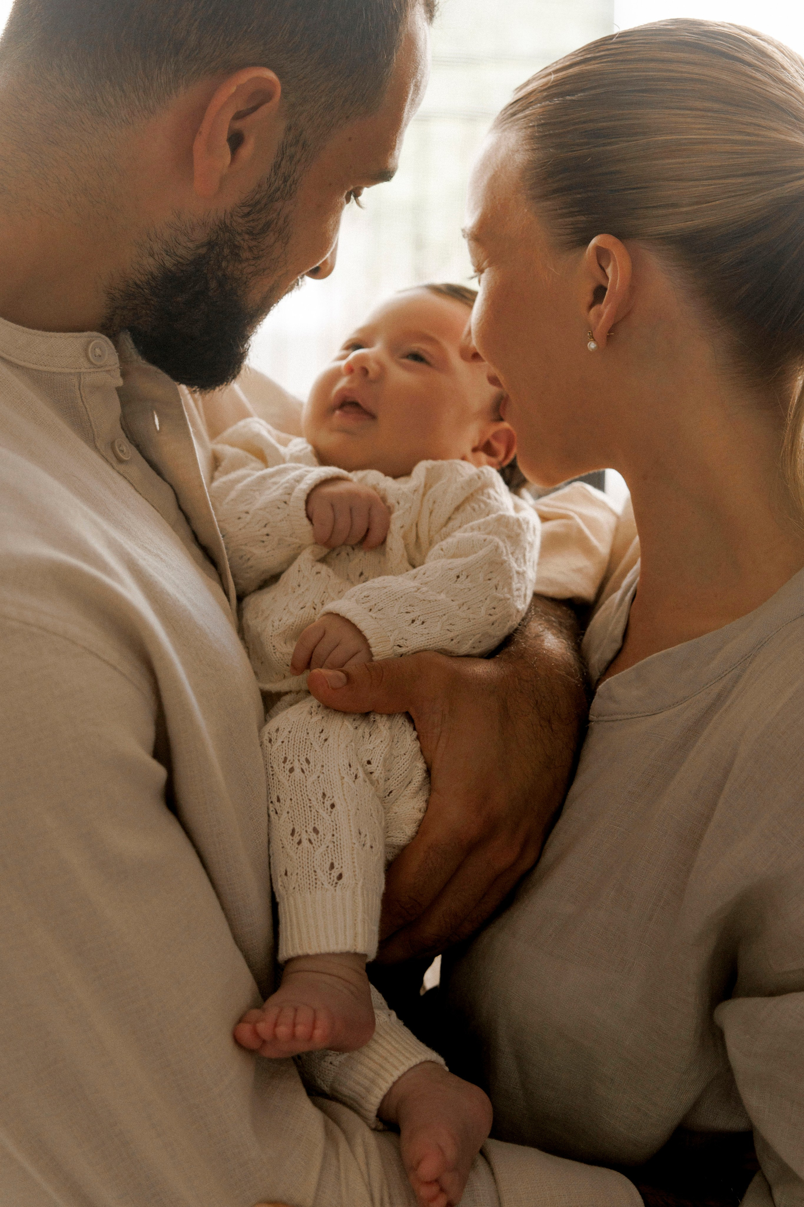 New born family photoshoot at home. Wedding and family photographer