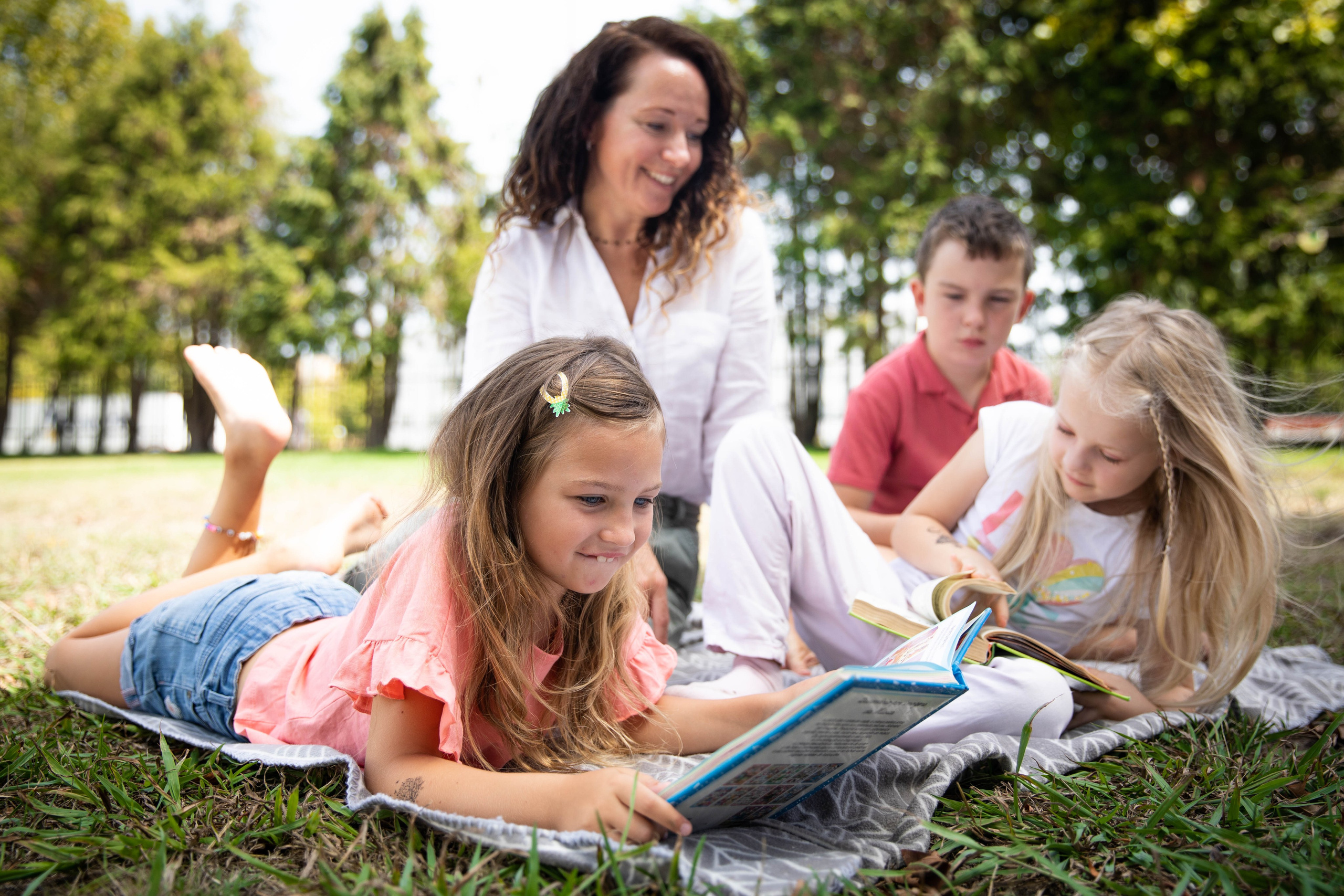 Kids enjoying a storytelling session, listening with wide eyes and bright smiles