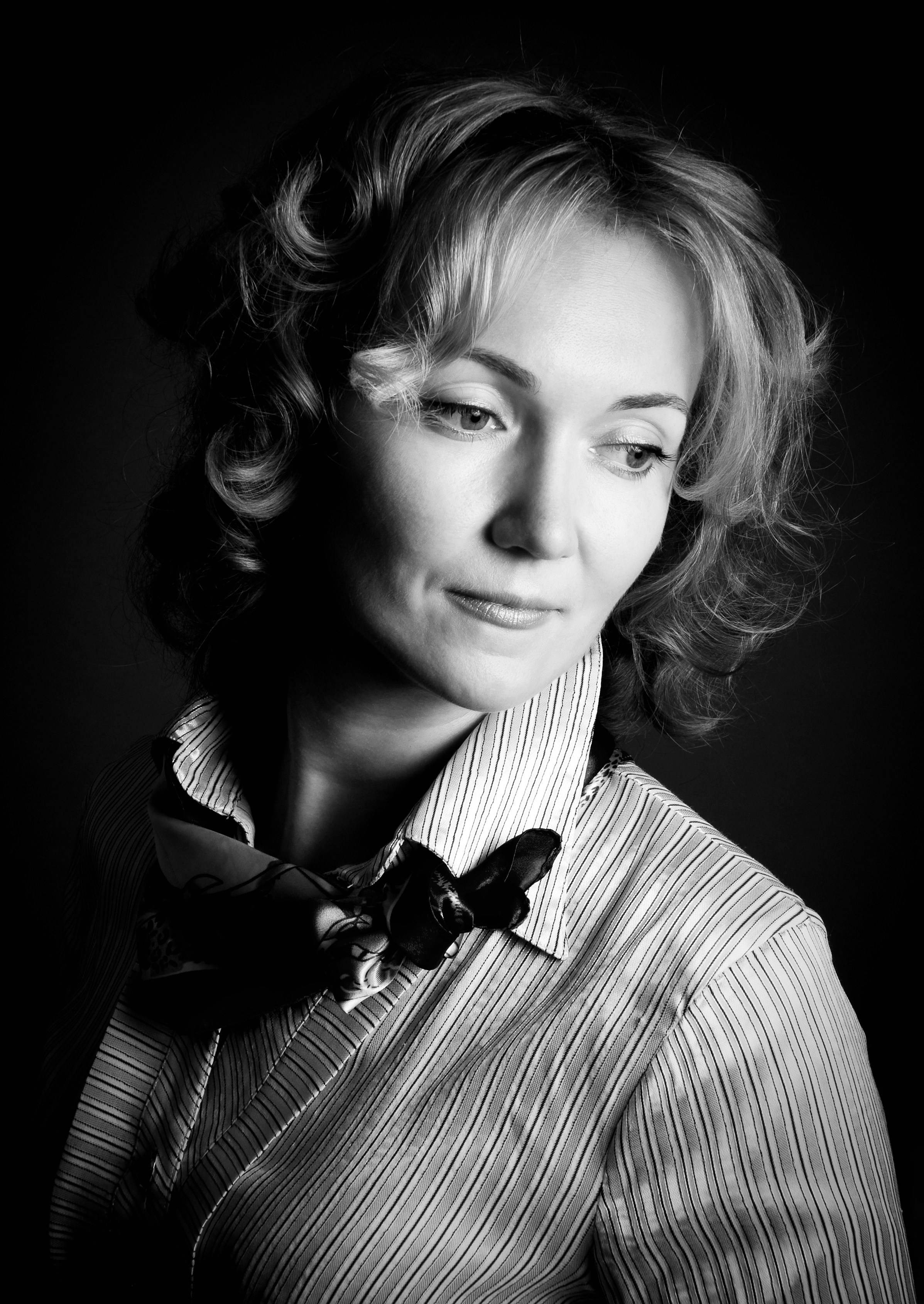 Фотография улыбающейся женщины