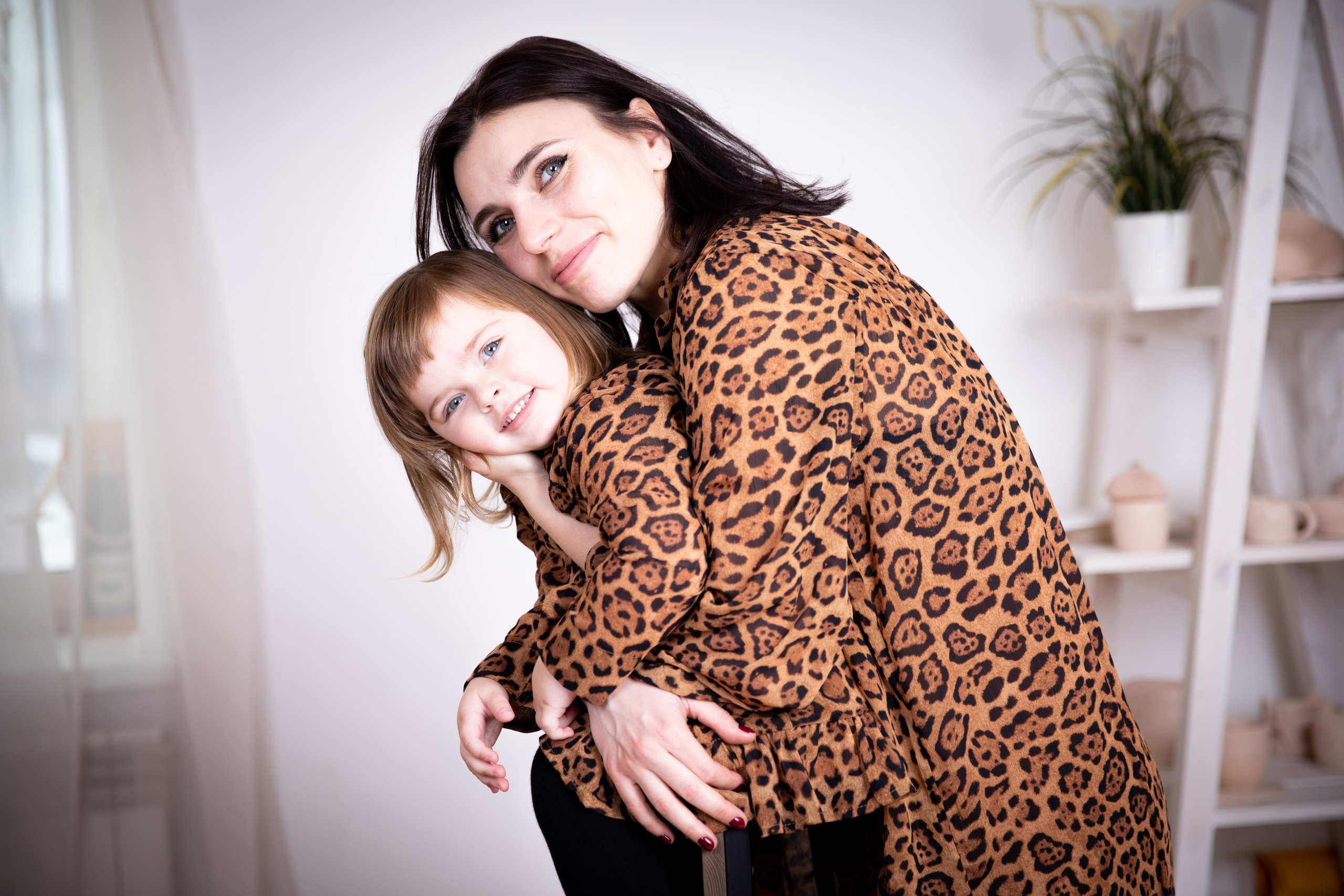 Mother and daughter at a studio photo shoot