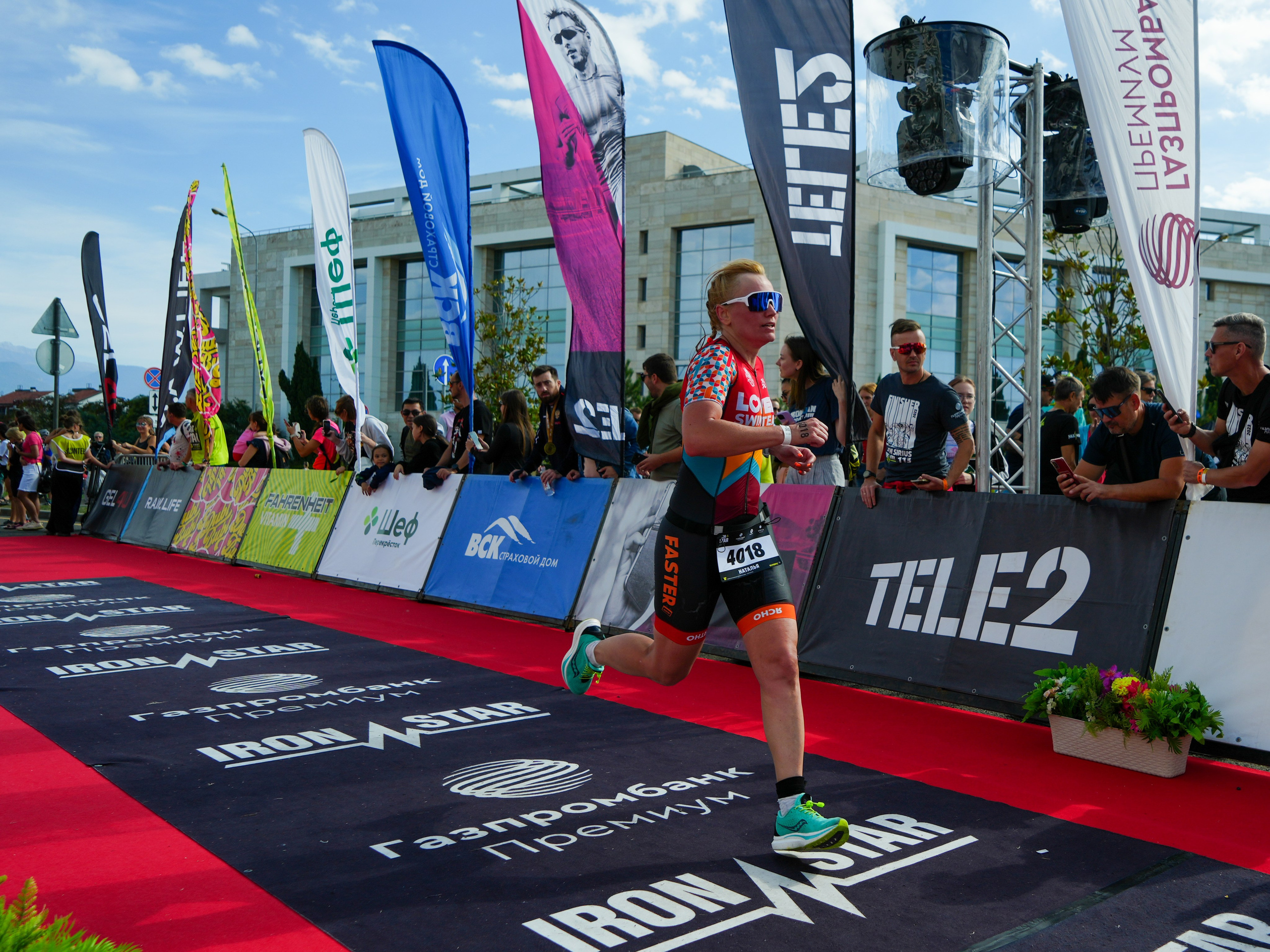 Фотоотчет партнерской интеграции для компании TELE2 на фестивале Ironstar. Репортажный фотограф в Красной Поляне и Сочи Павлюченко Екатерина