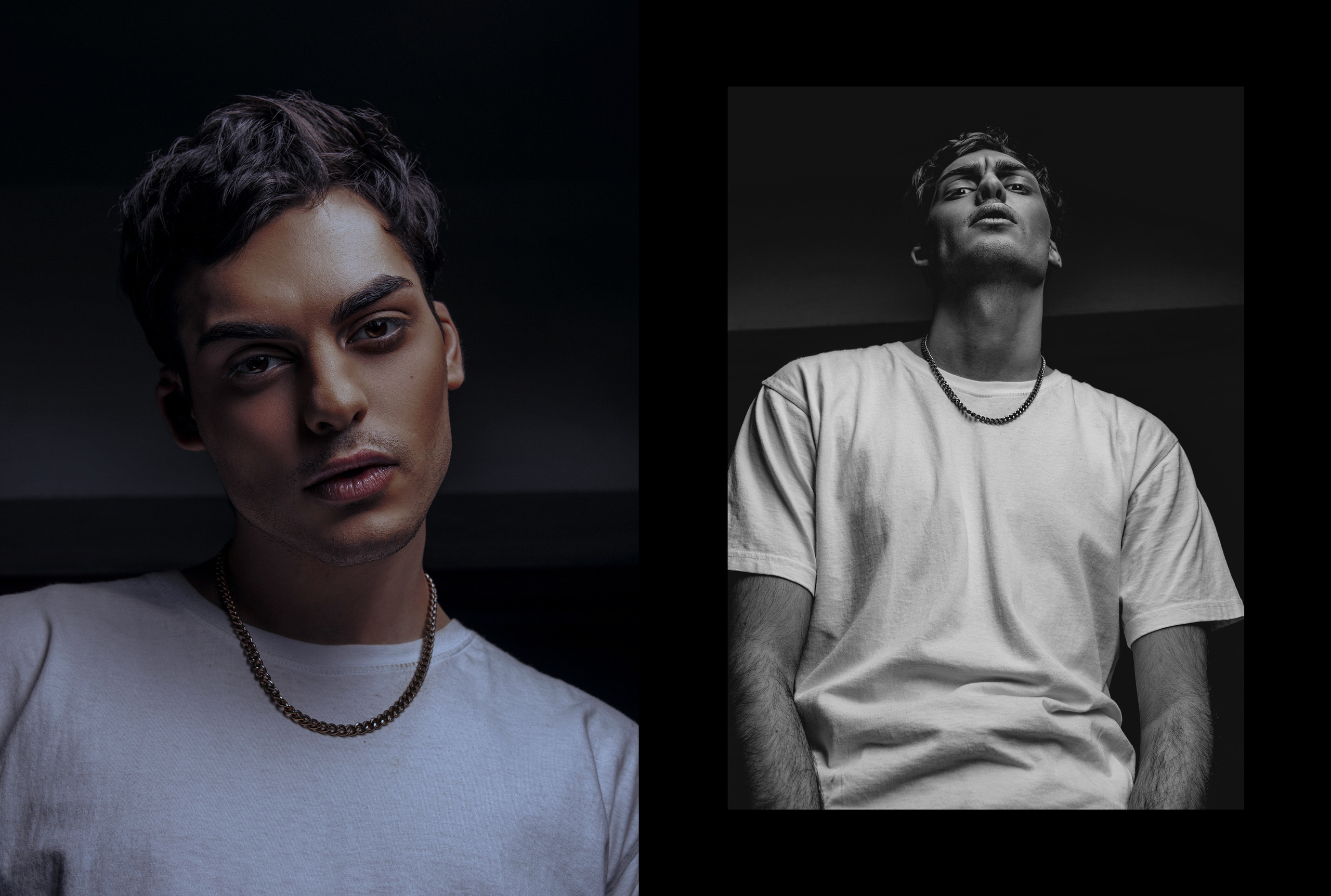 Красивый парень с большими глазами и черными волосами в белой рубашке смотрит в камеру.