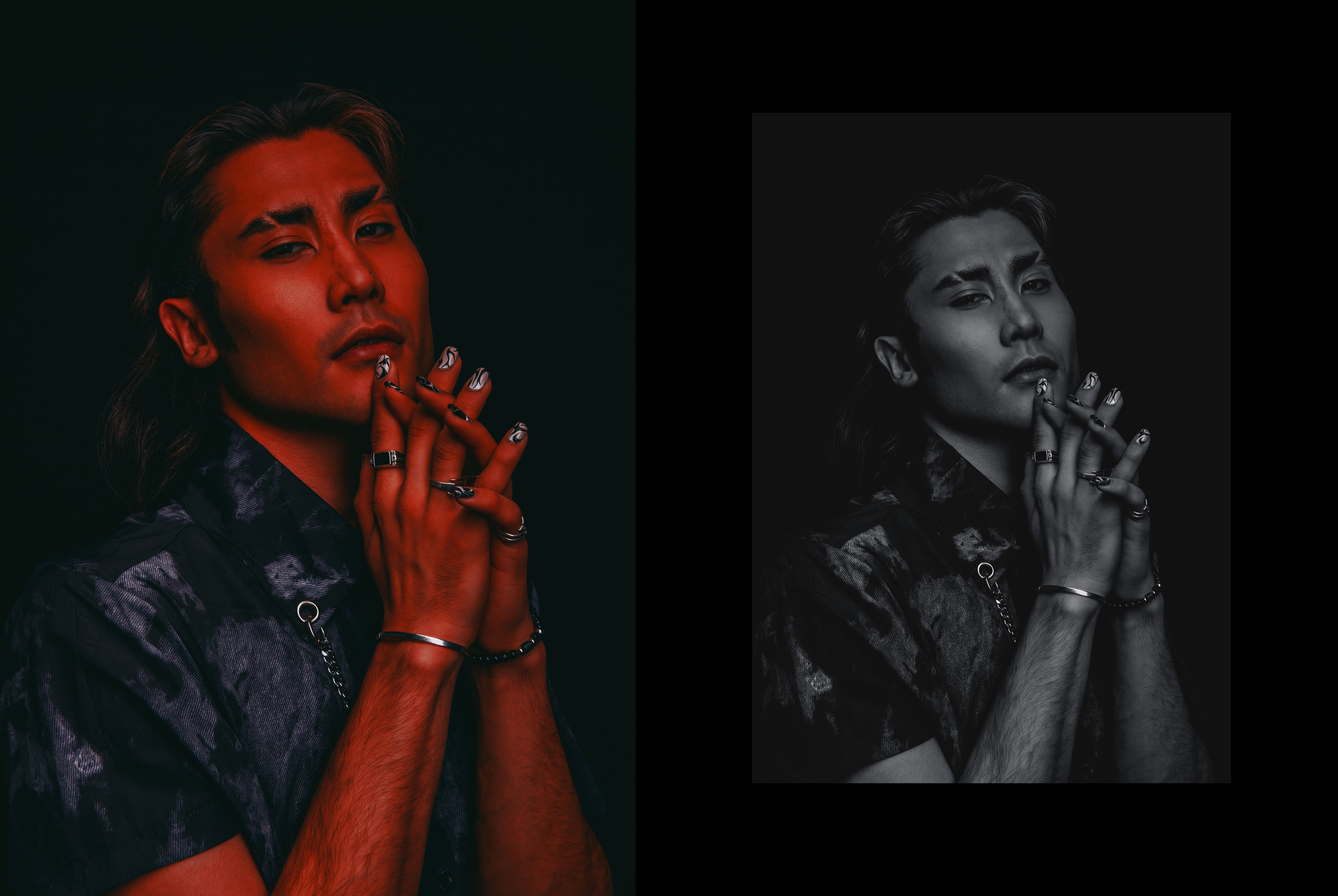 Азиатский парень-модель держит руки у лица и смотрит в камеру.