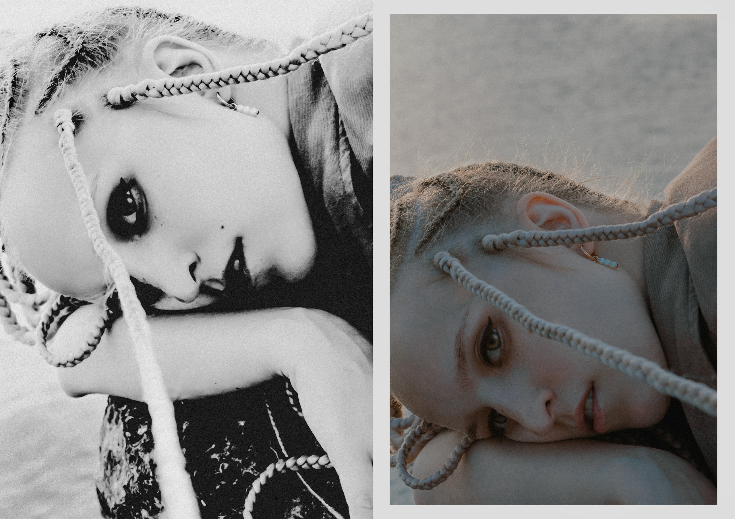 Портрет девушки с дредами и мелкими косичками, которая лежит на  камне у воды.