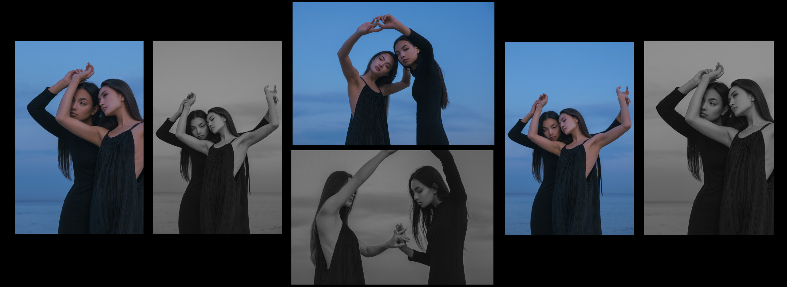Две девушки азиатской внешности танцуют с поднятыми руками  на берегу в черных платьях.