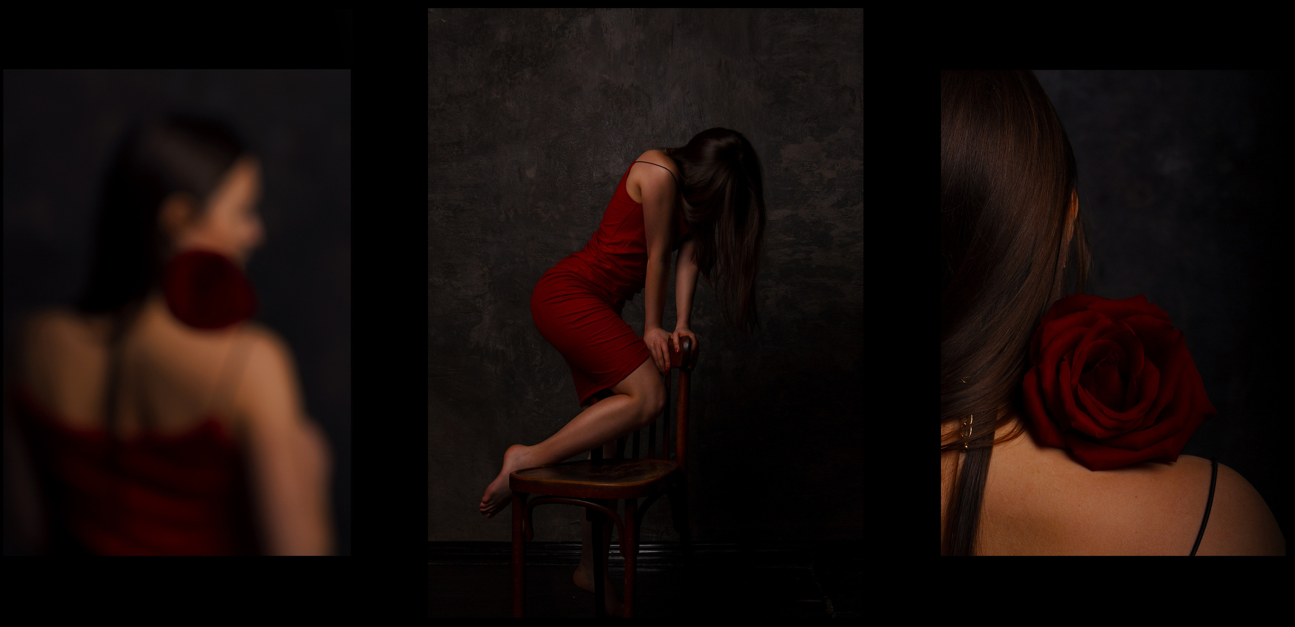 Девушка в красном платье сидит верхом на стуле с опущенной головой и красной розой на плече.