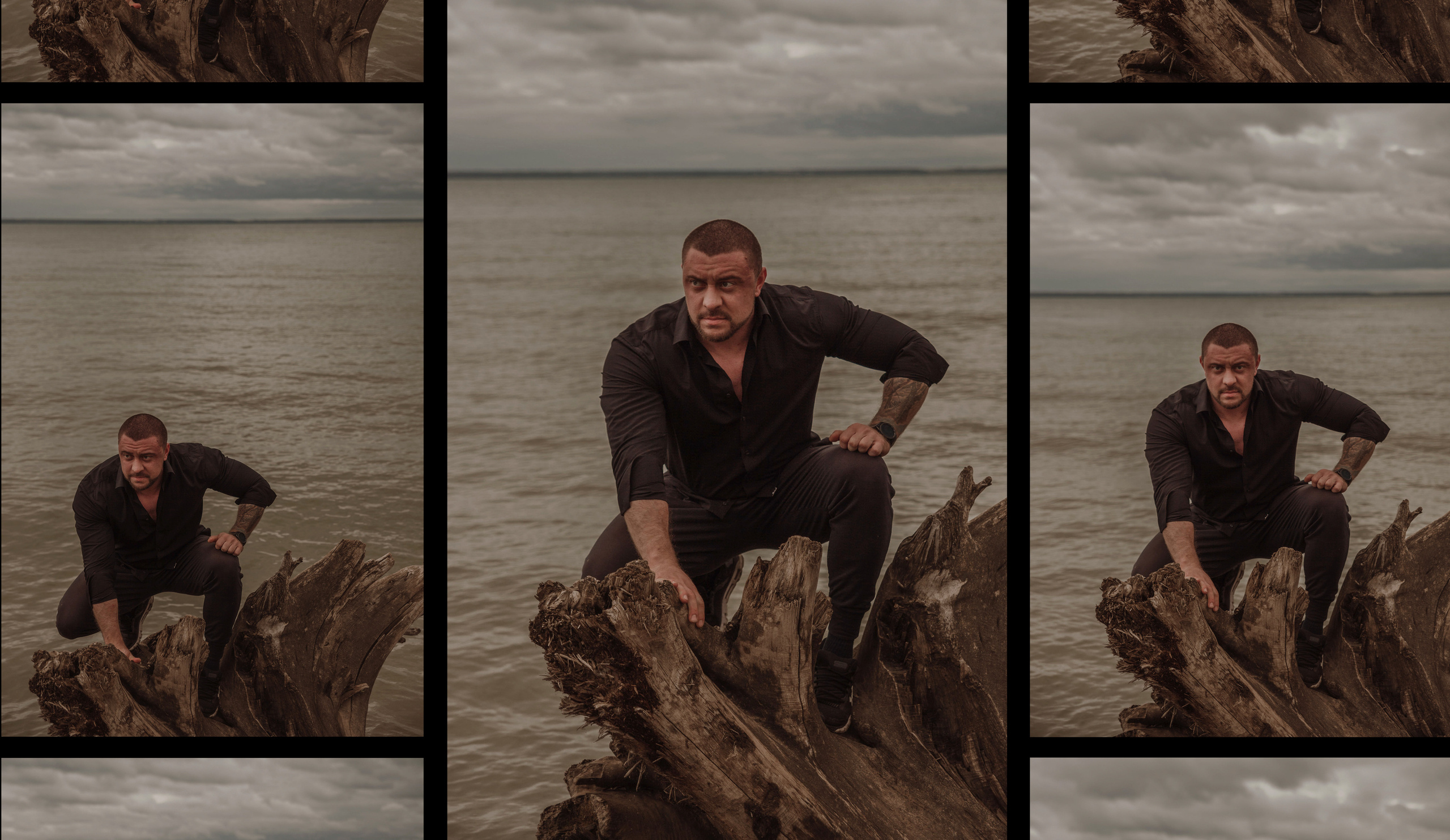 Мужчина бодибилдер в черной рубашке сидит на бревне на берегу на фоне воды в хмурый пасмурный день.