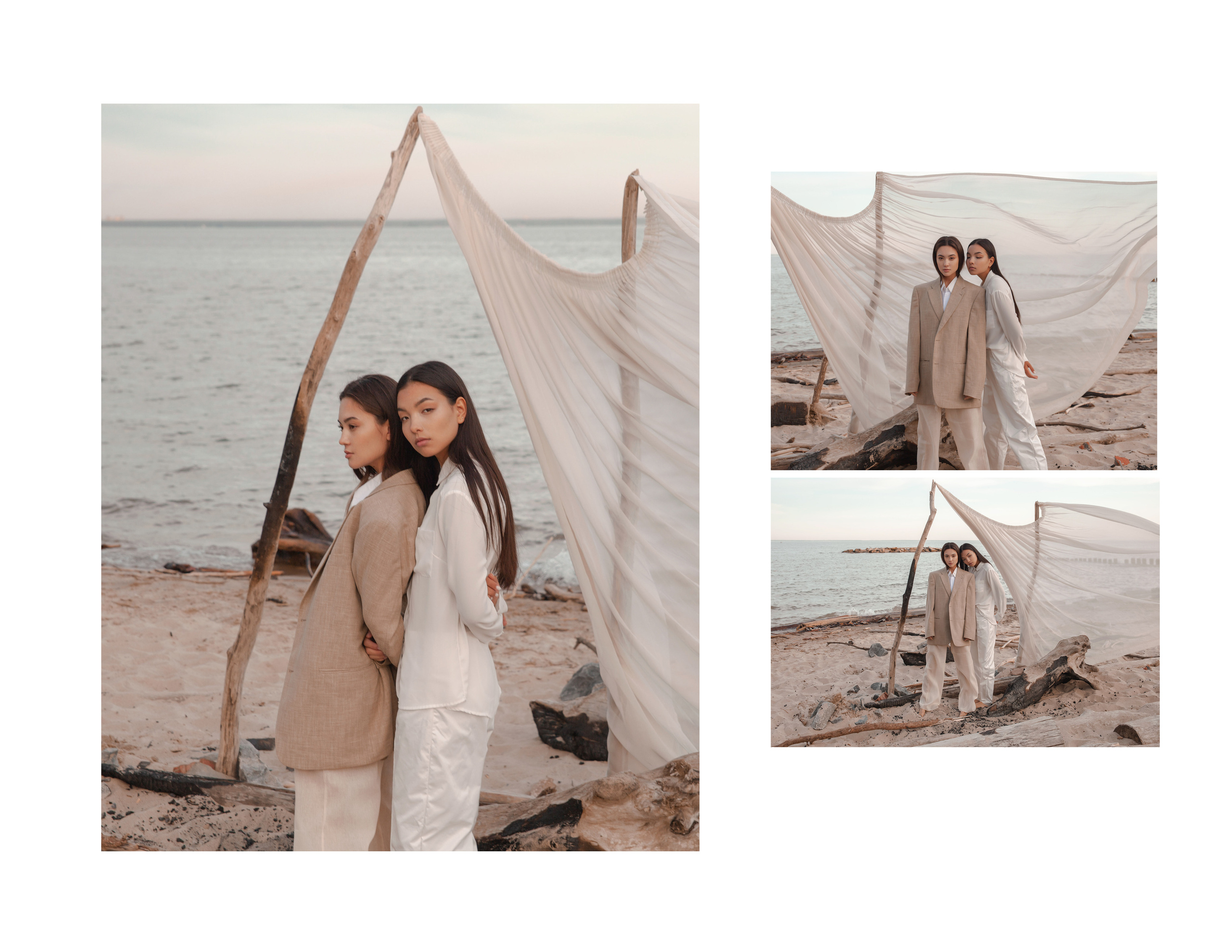 Две азиатские девушки в светлых костюмах у моря на тканевом прозрачном развевающемся на ветру фоне.