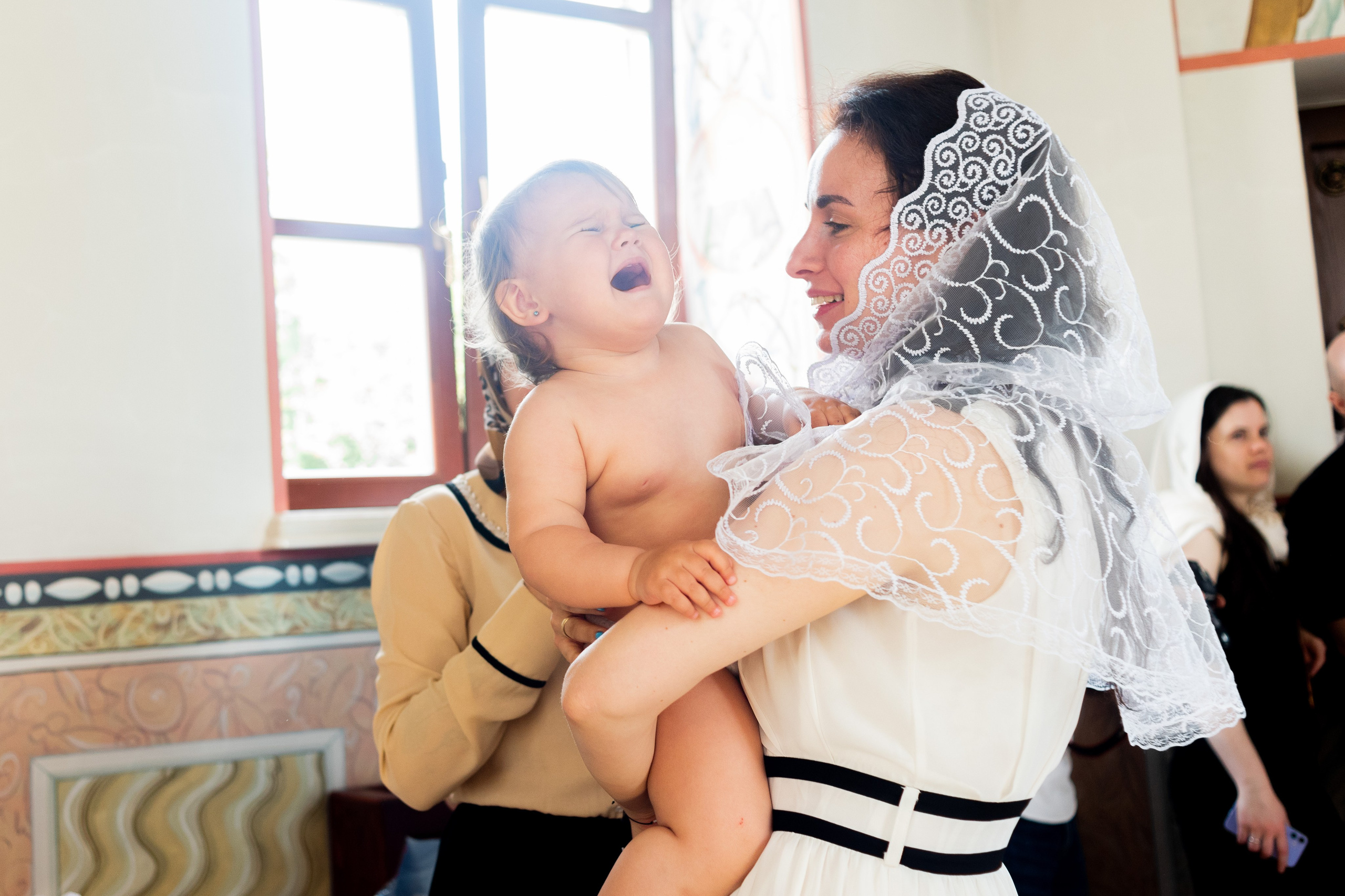 Крещение Ники. Фотограф Юлия Попова