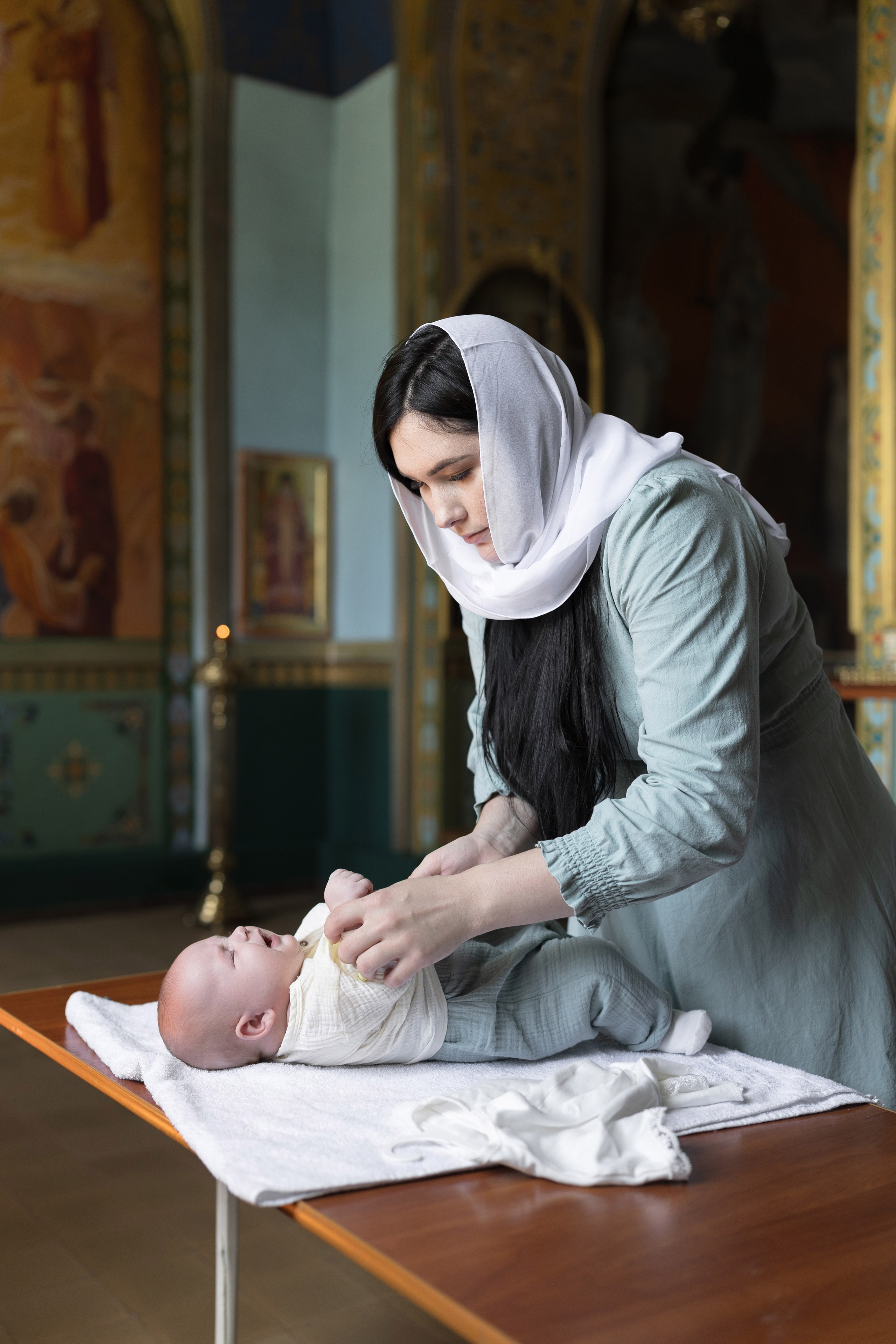 Крещение Егора в Николаевской церкви. Анастасия Безуглова- свадебный фотограф в Таганроге