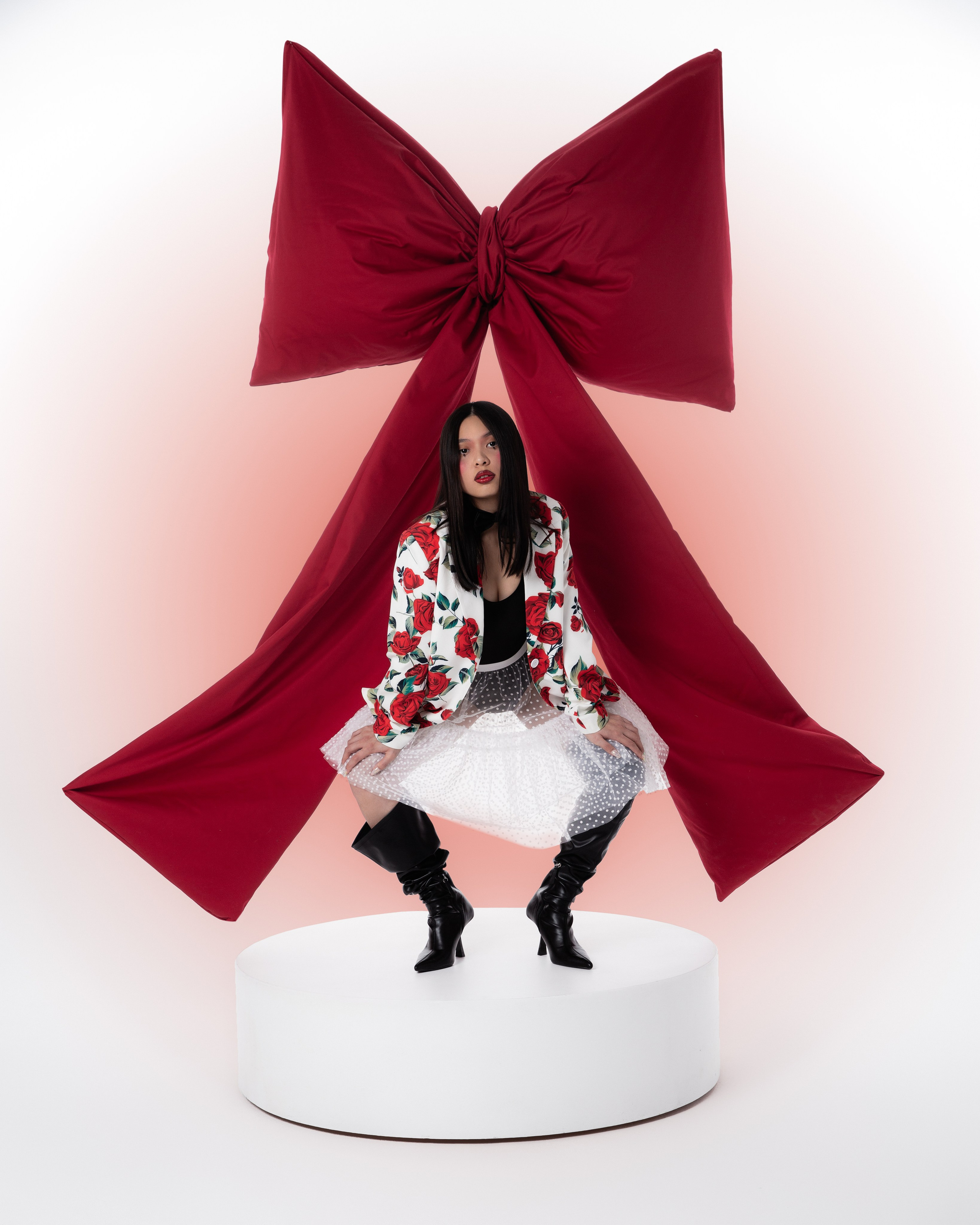 Bow. Photographer. Producer. Retoucher