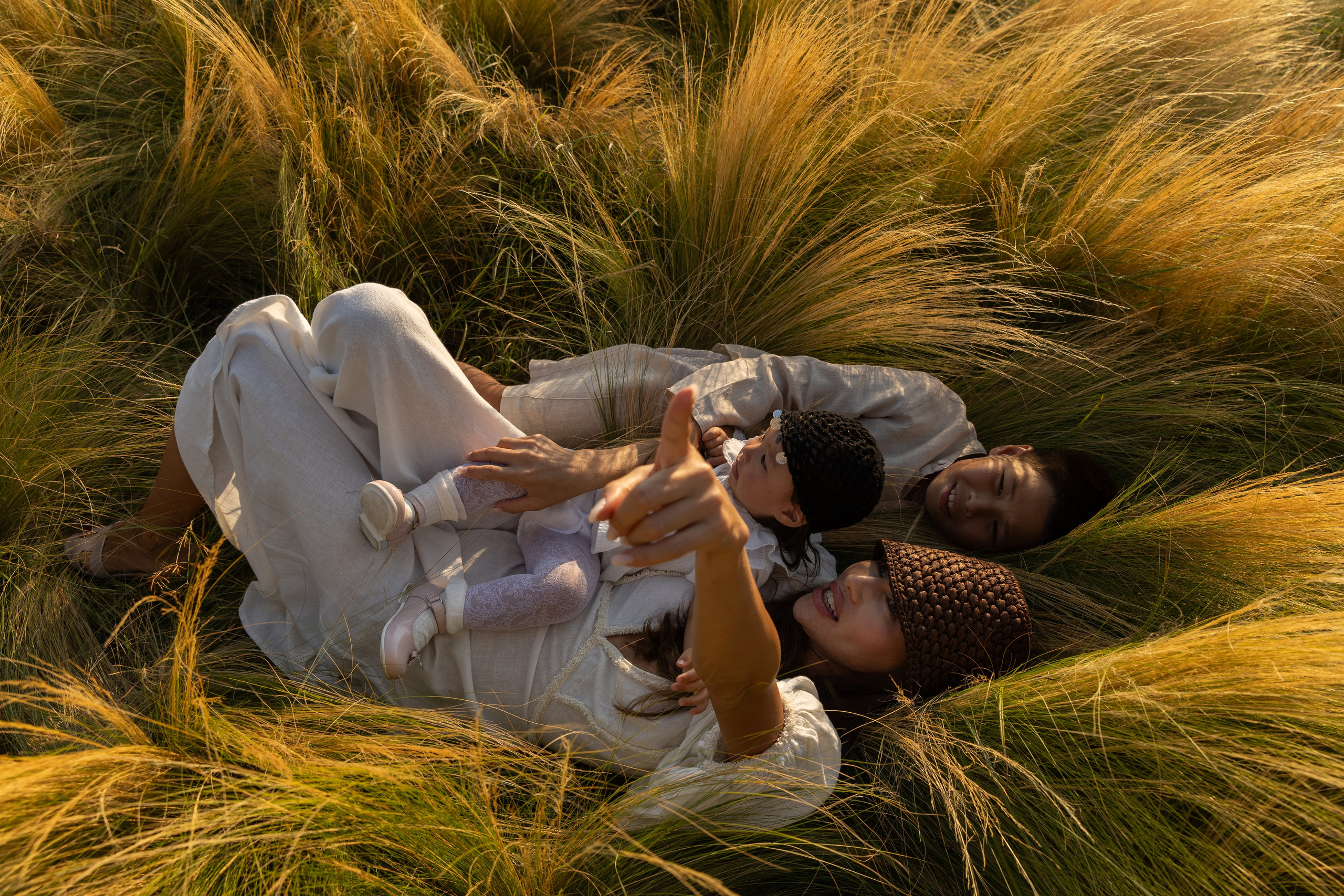 Family on Grass. Anastasia Lanina — Fashion & Portrait Photographer in Bodrum