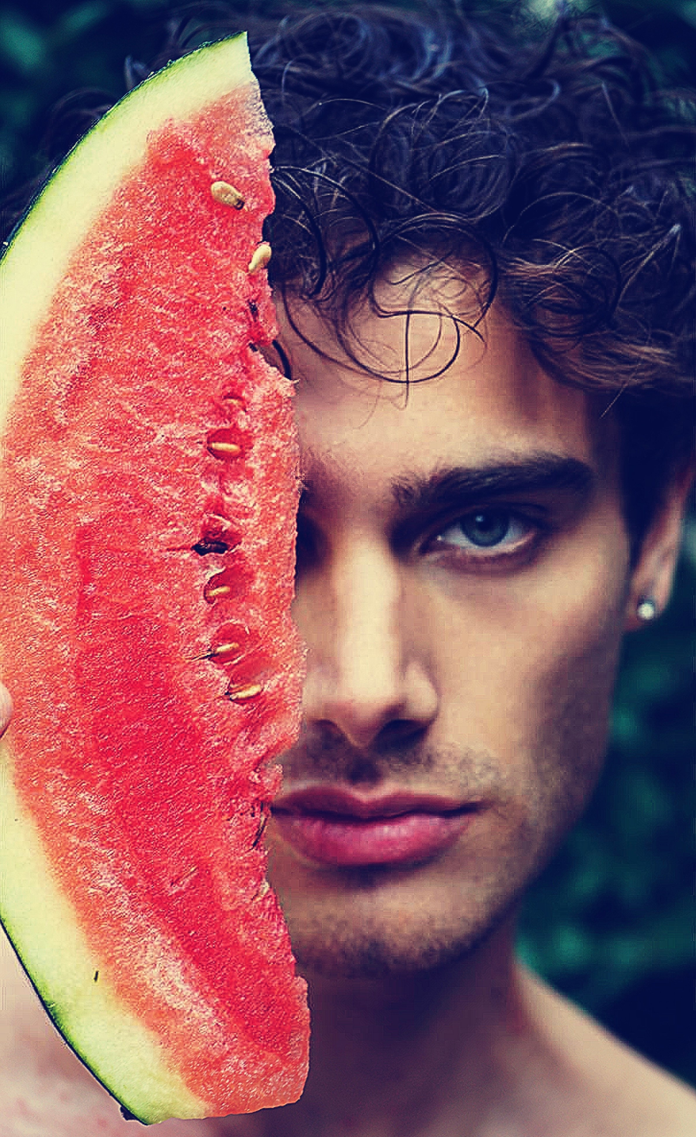 Creative fashion portrait – male model with watermelon, artistic editorial photography.