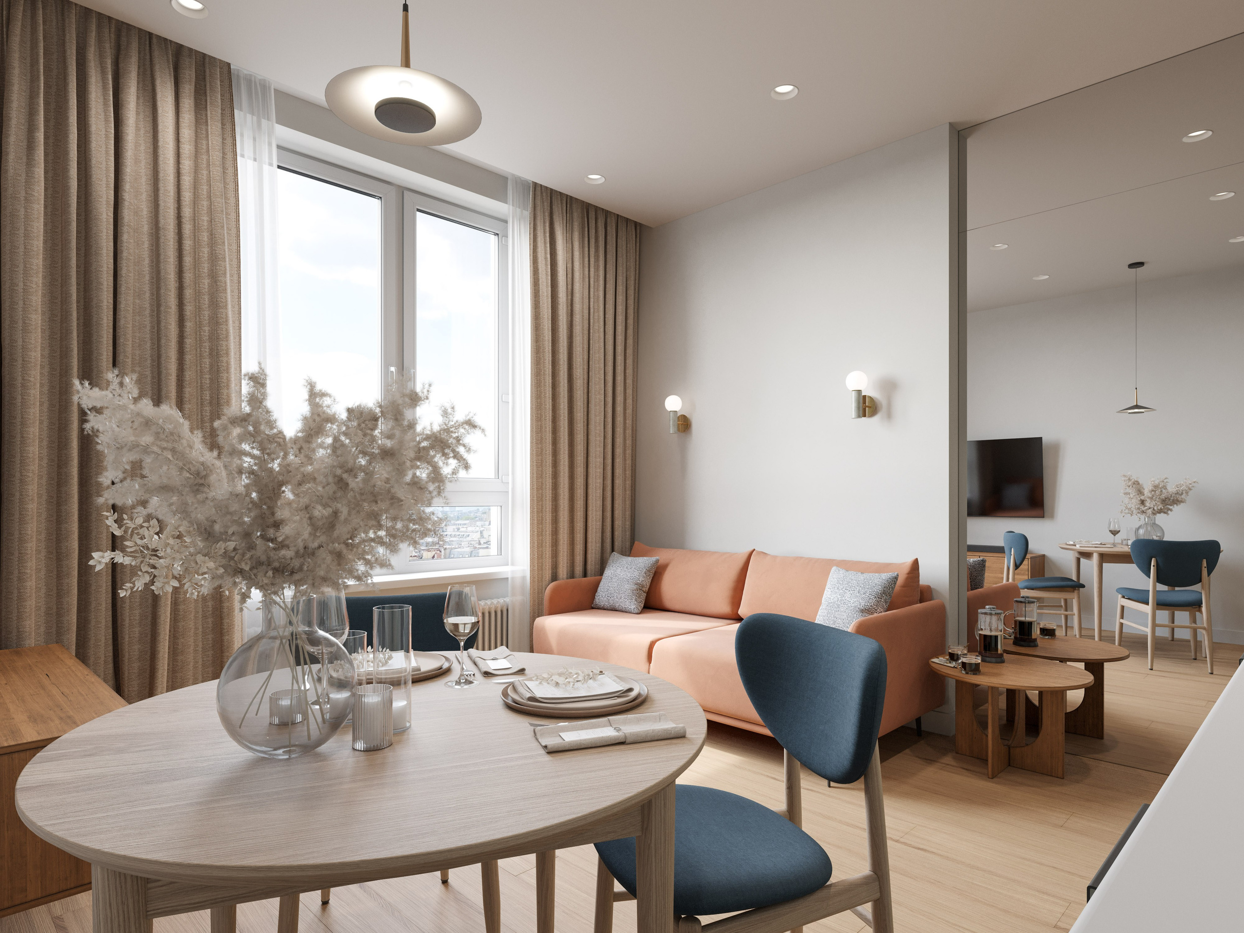 Обеденная зона с синими стульями и круглым столом в светлом интерьере